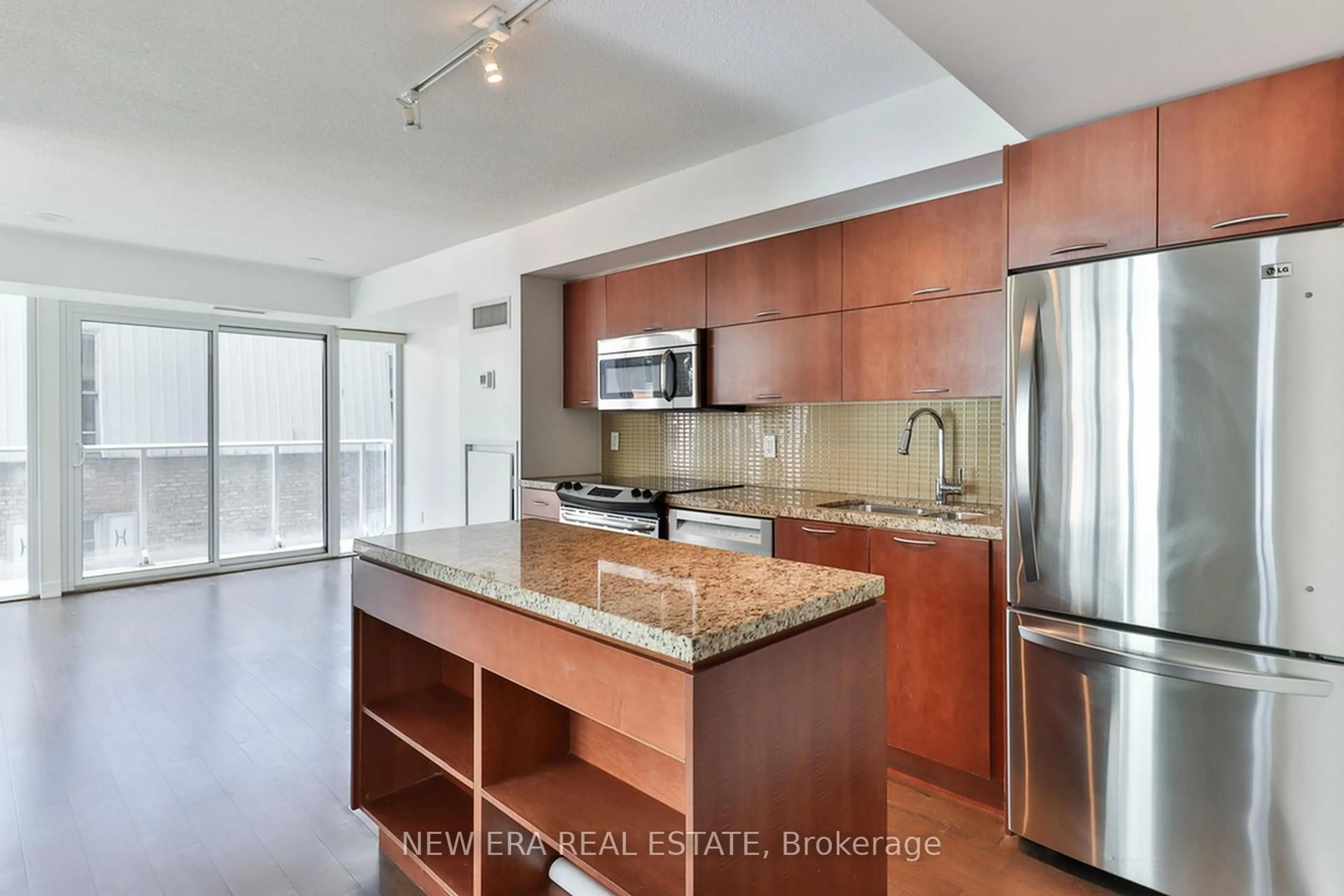 Open concept kitchen, ceramic/tile floor for 126 Simcoe St #411, Toronto Ontario M5H 4E6