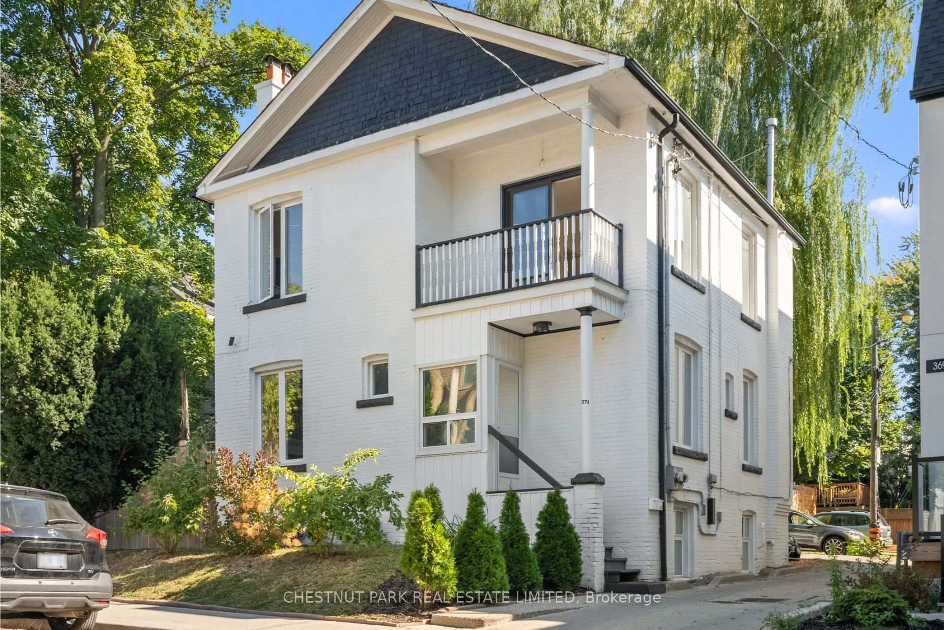 Home with brick exterior material, street for 371 Howland Ave, Toronto Ontario M5R 3C1