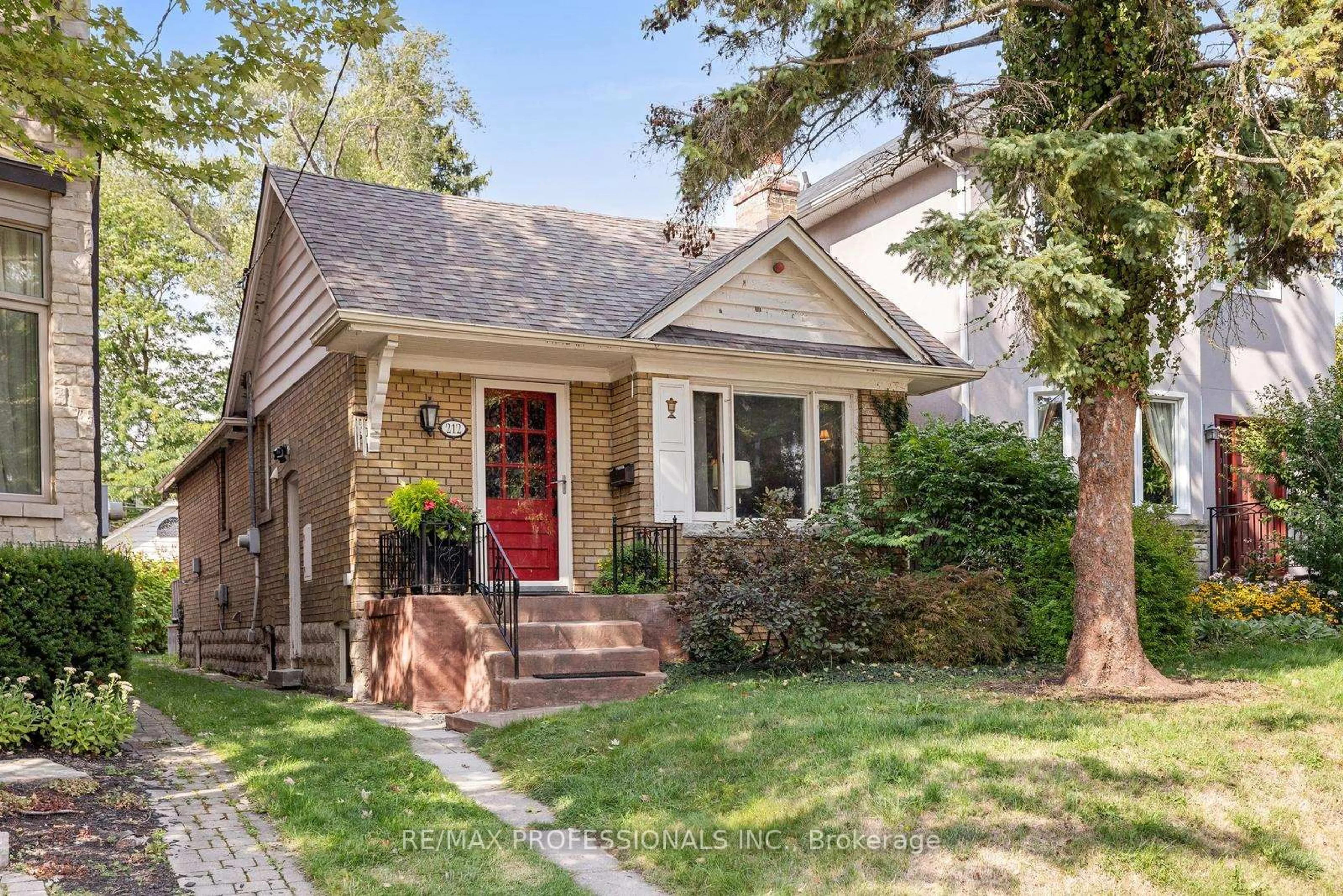 Home with brick exterior material, street for 212 Douglas Ave, Toronto Ontario M5M 1G8