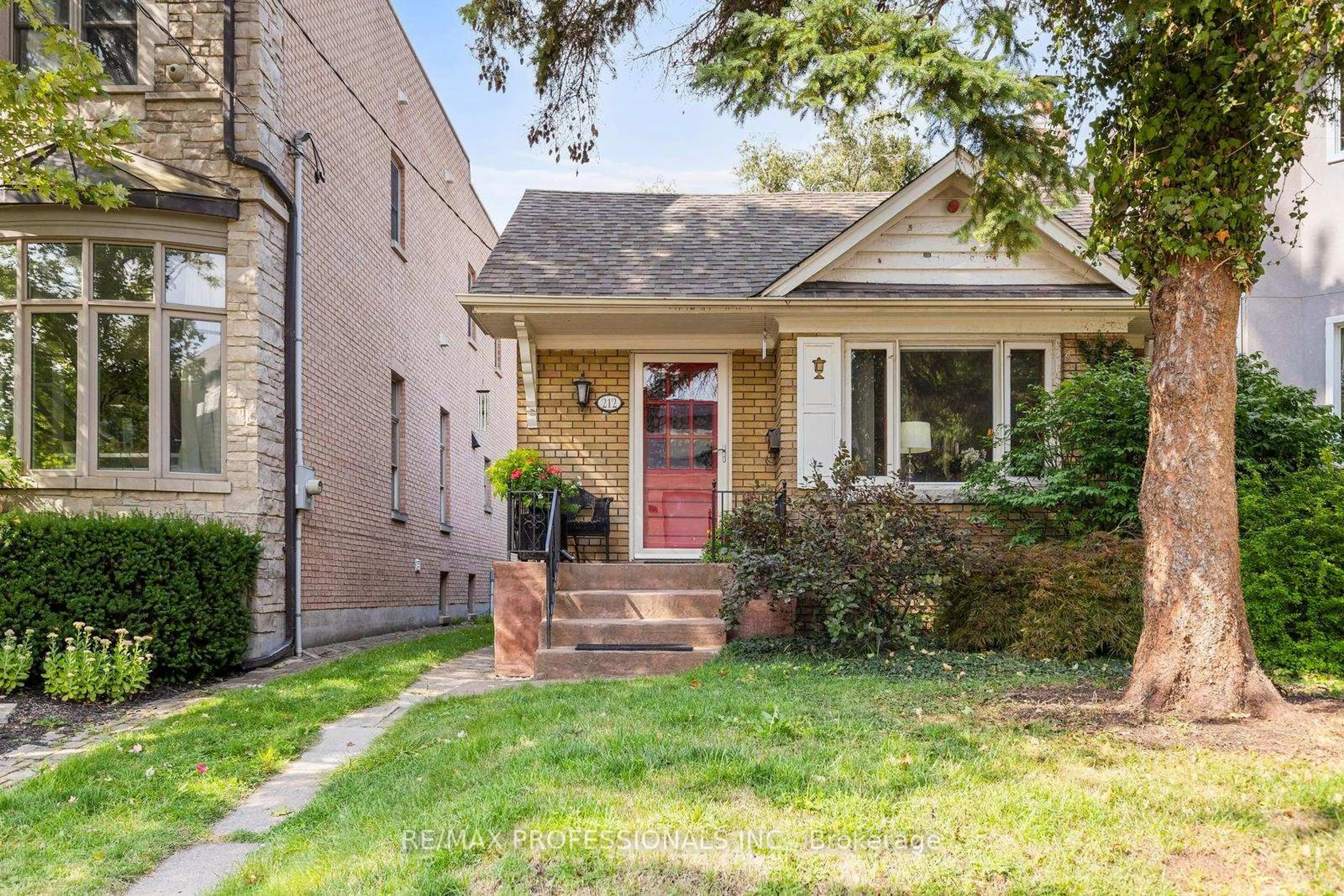 Home with brick exterior material, street for 212 Douglas Ave, Toronto Ontario M5M 1G8