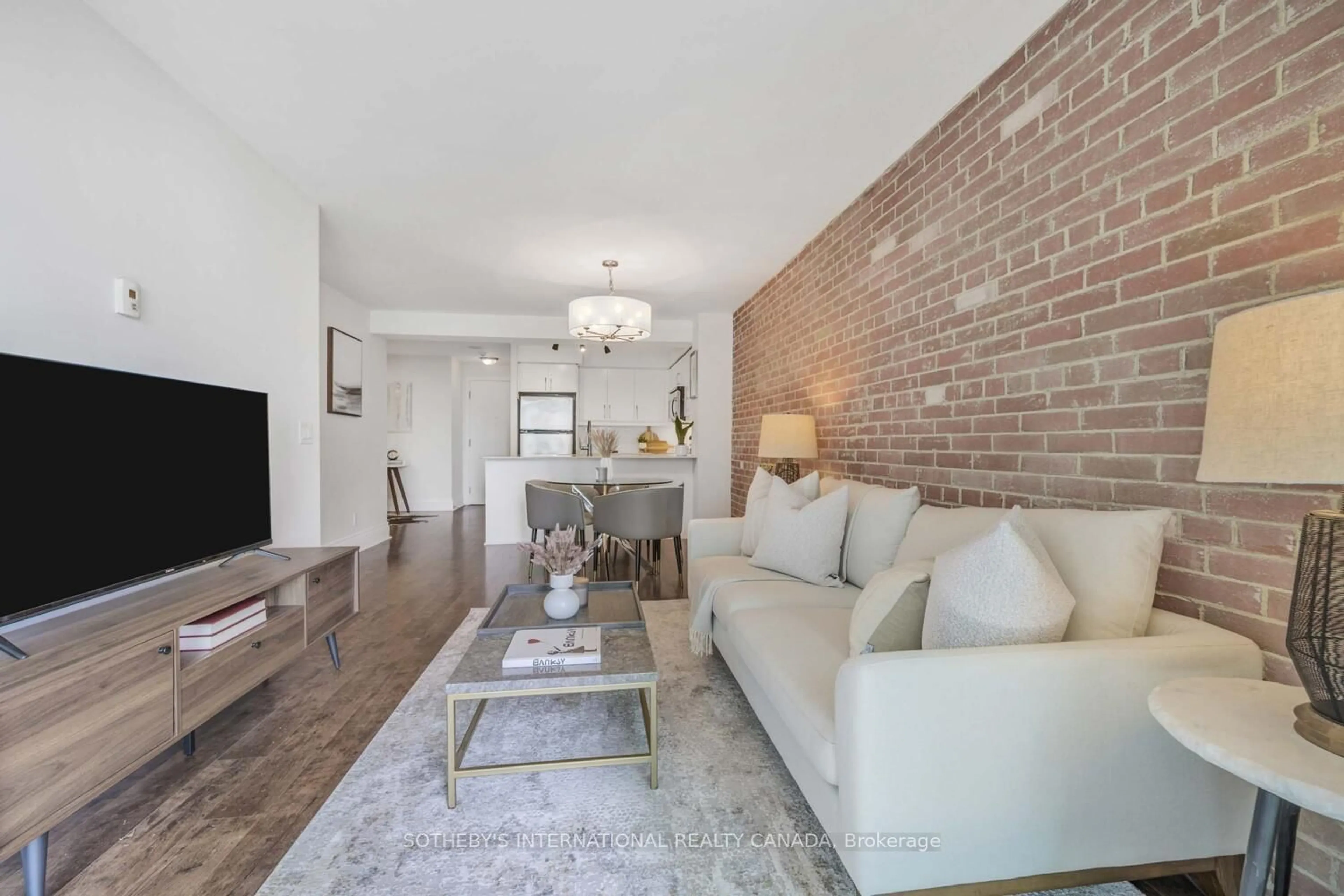 Living room with furniture, unknown for 1 Scott St #803, Toronto Ontario M5E 1A1