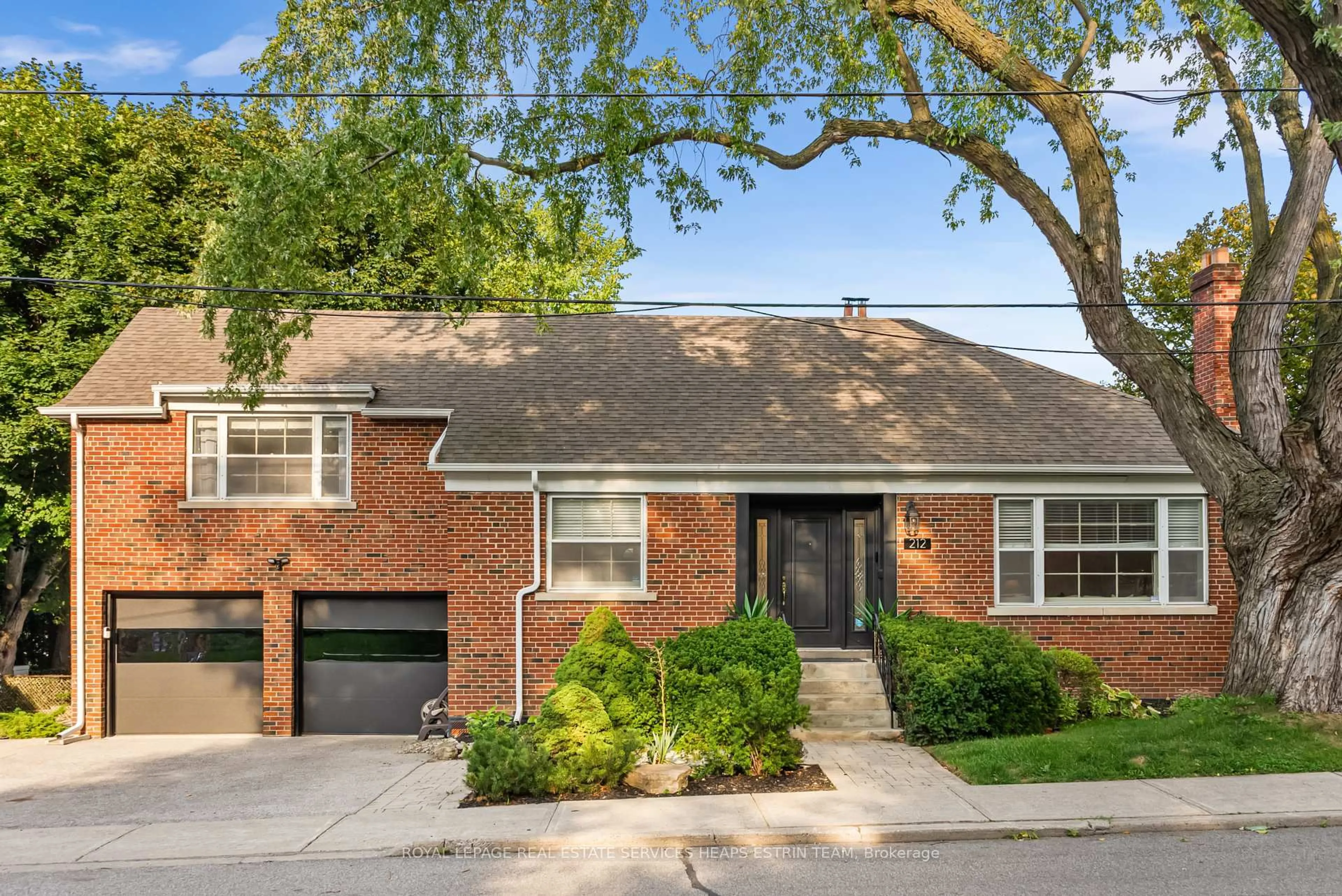 Home with brick exterior material, street for 212 York Mills Rd, Toronto Ontario M2L 1L1