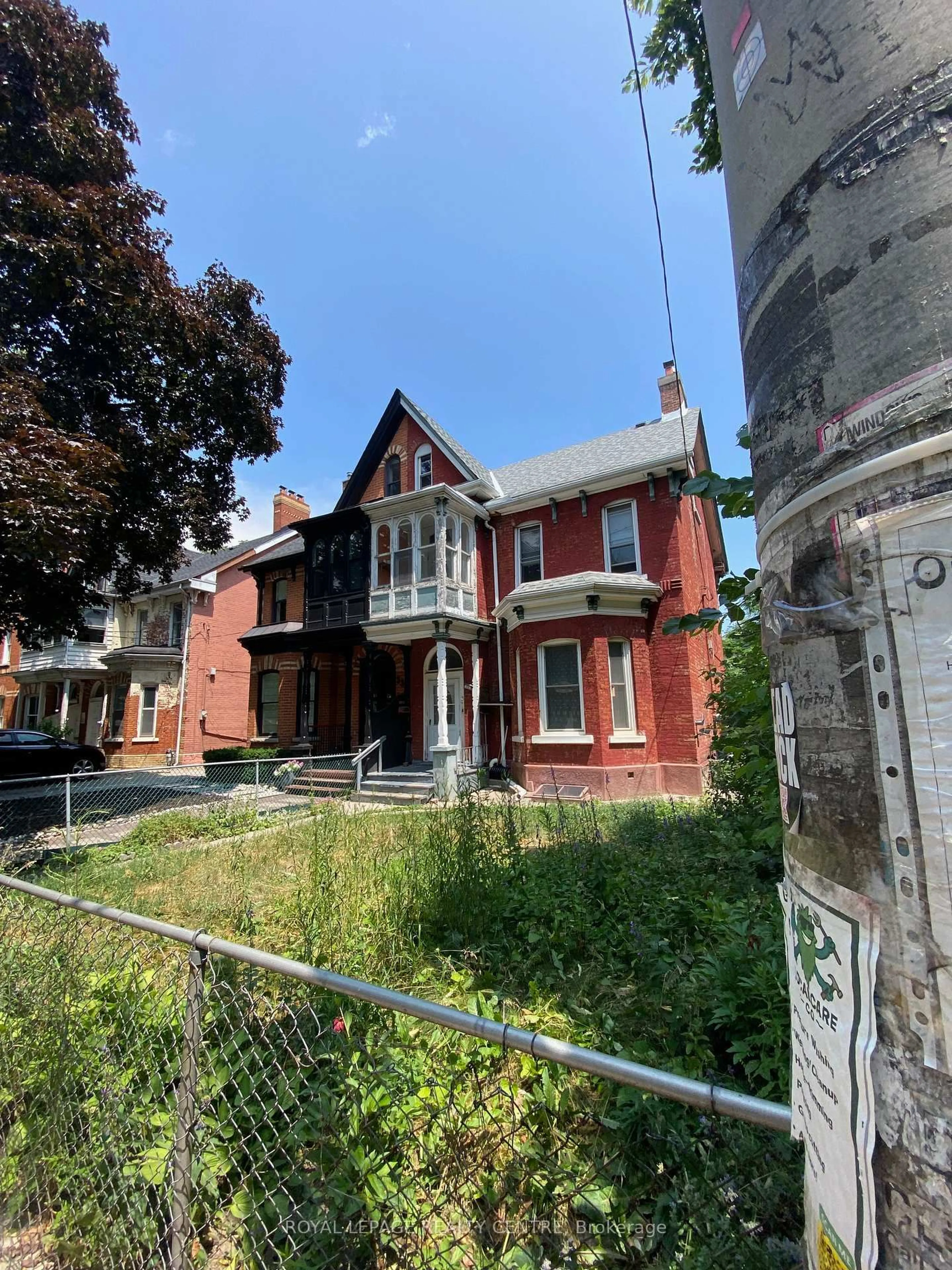 Home with brick exterior material, street for 31 Beaconsfield Ave, Toronto Ontario M6J 3J1