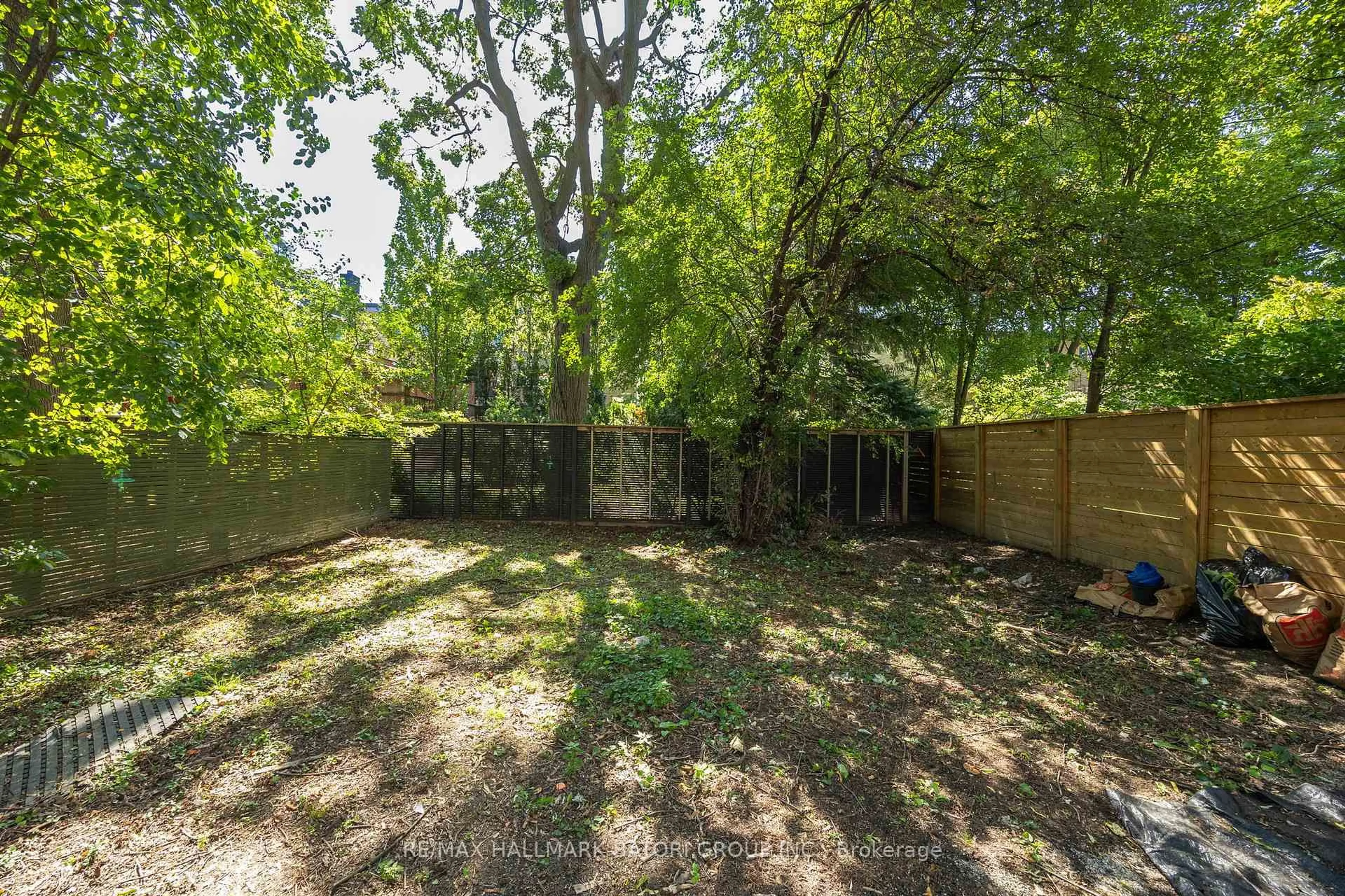 A pic from outside/outdoor area/front of a property/back of a property/a pic from drone, forest/trees view for 103 Heath St, Toronto Ontario M4V 1T5