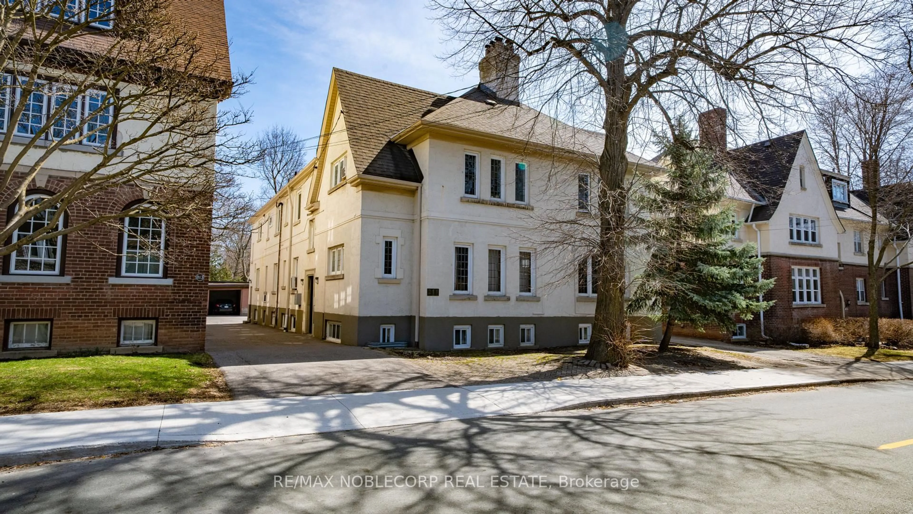 Home with brick exterior material, street for 809-811 Duplex Ave, Toronto Ontario M4R 1W6