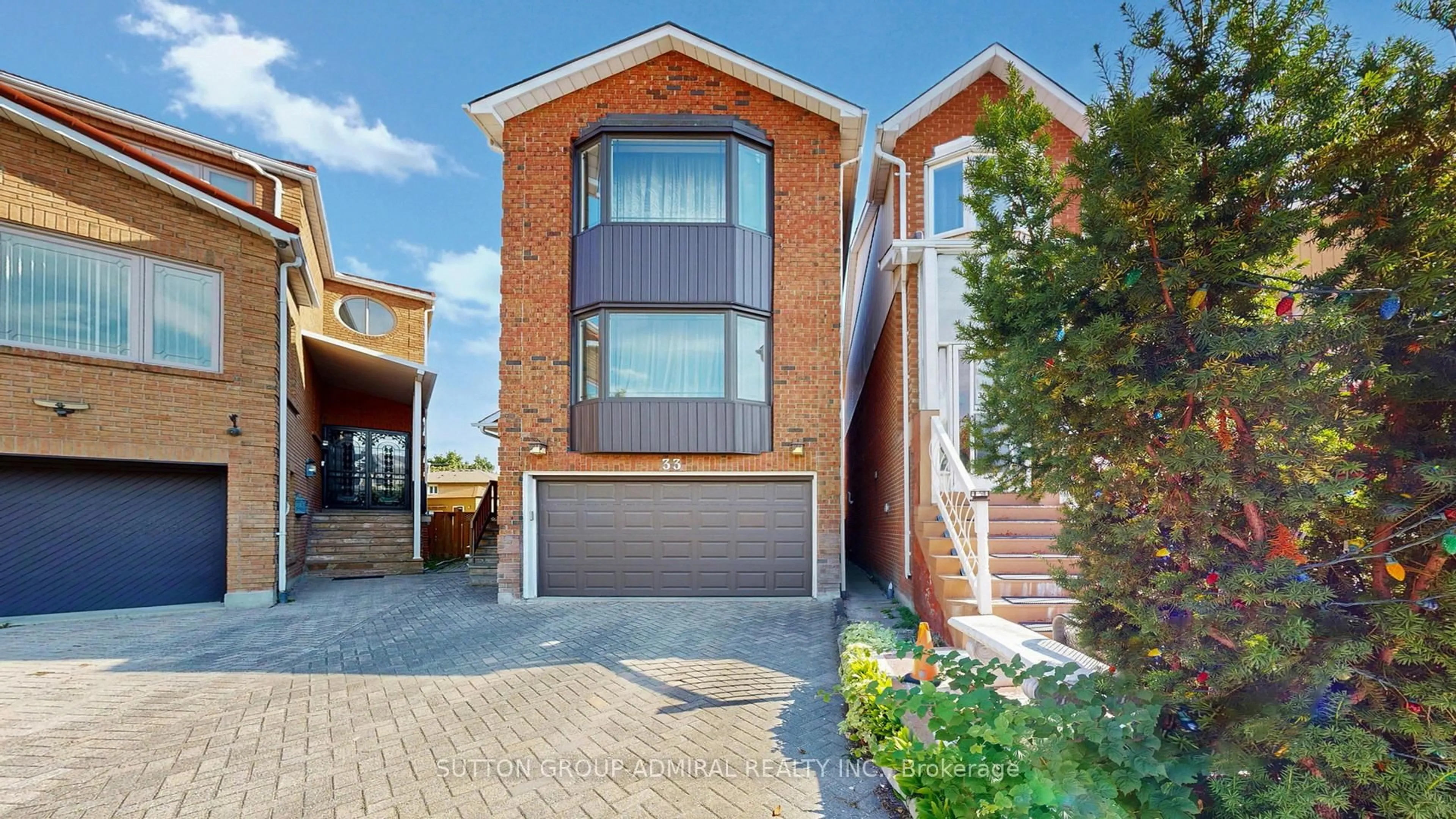 Home with brick exterior material, street for 33 Carnival Crt, Toronto Ontario M2R 3T7