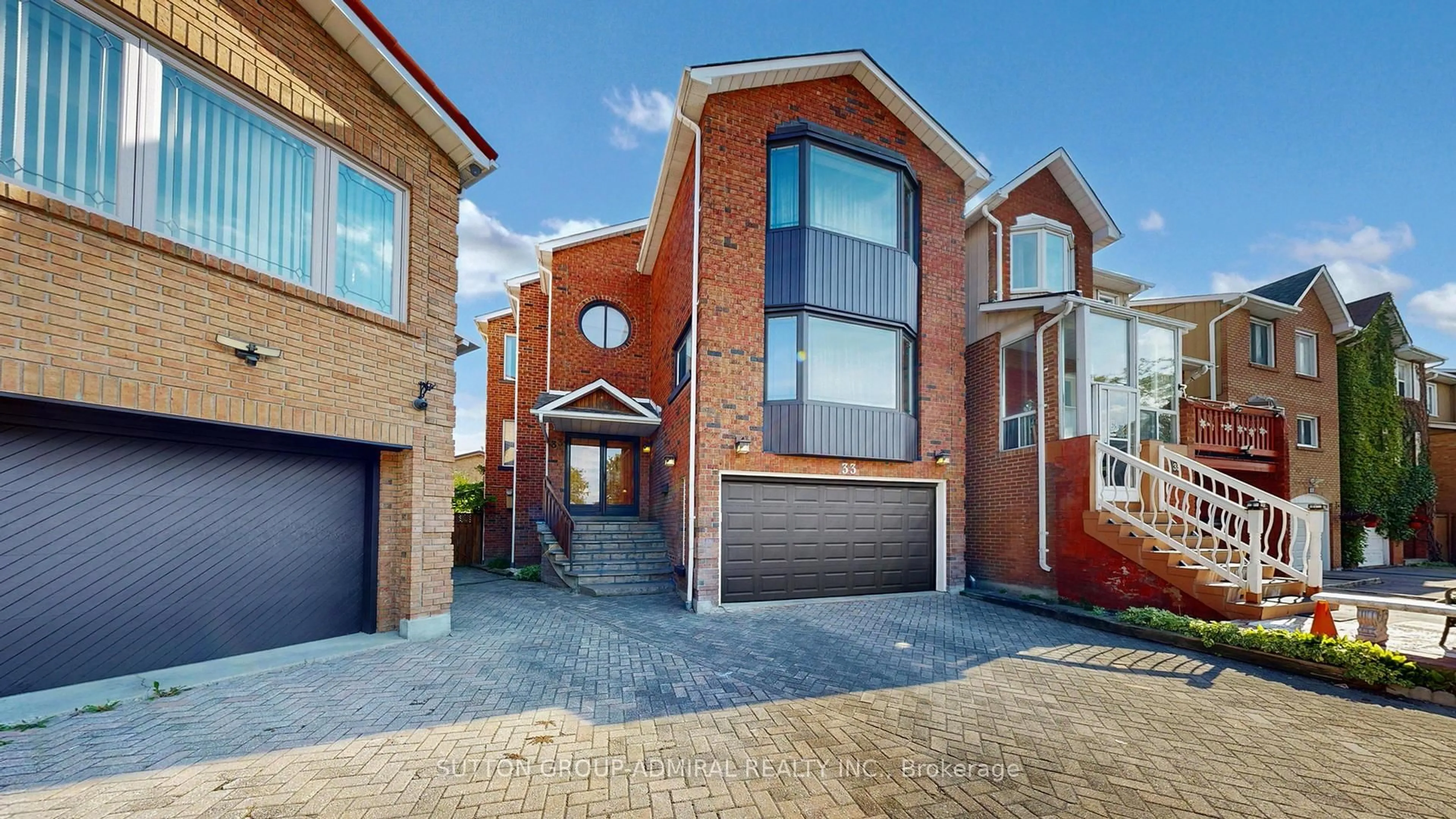 Home with brick exterior material, street for 33 Carnival Crt, Toronto Ontario M2R 3T7