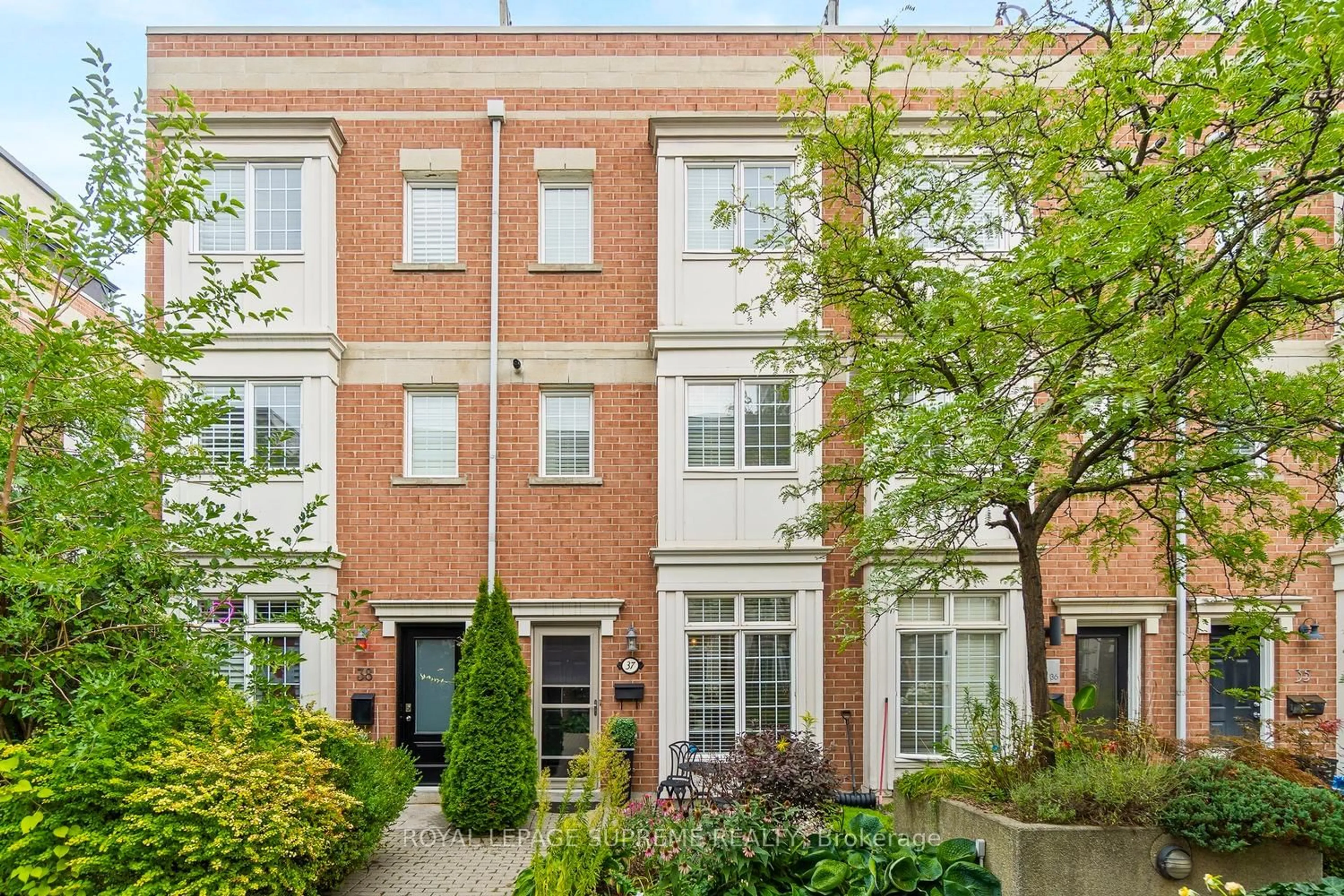 Home with brick exterior material, street for 6 Wellesley Pl #37, Toronto Ontario M4Y 3E1