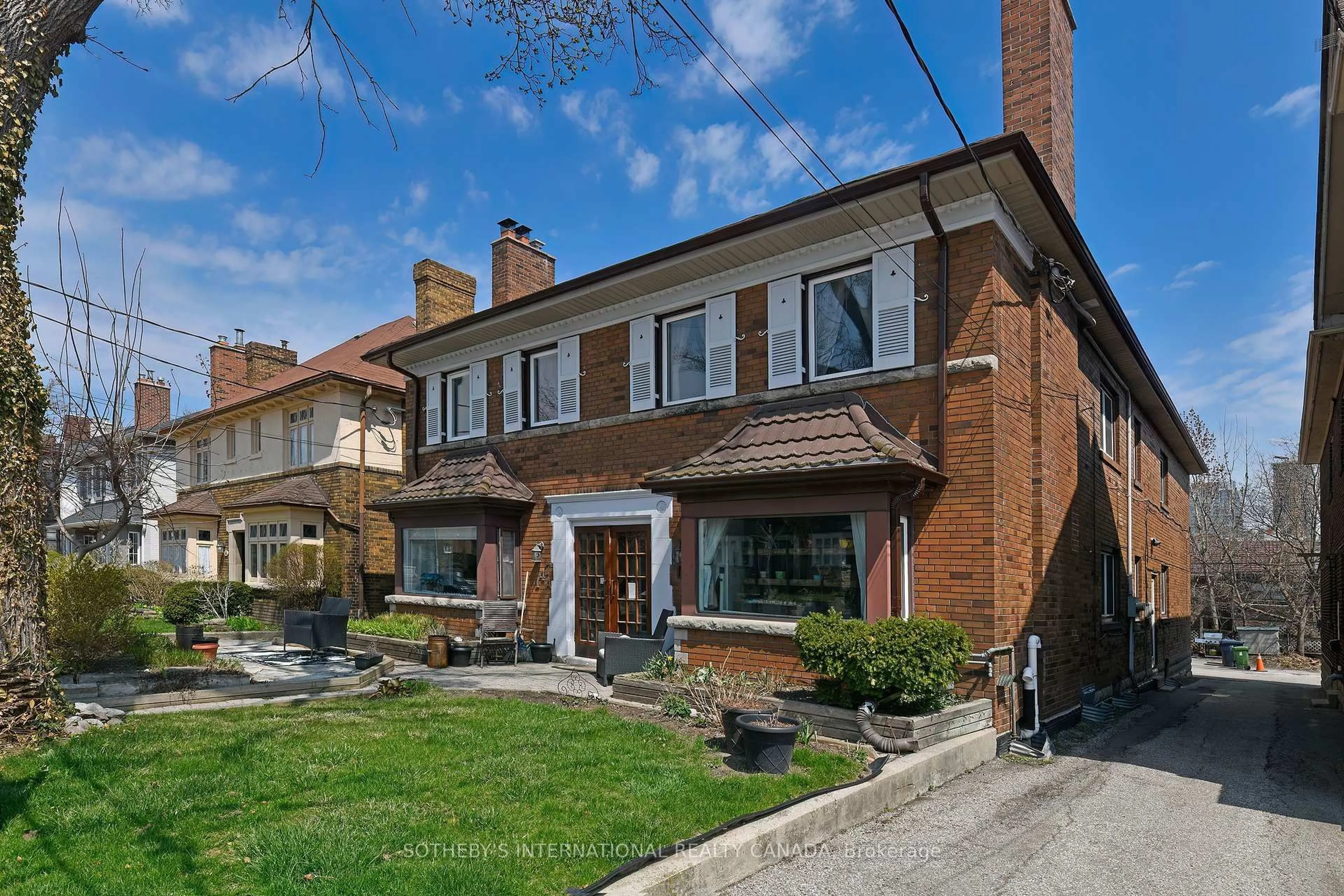 Home with brick exterior material, street for 147 Highbourne Rd, Toronto Ontario M5P 2J8
