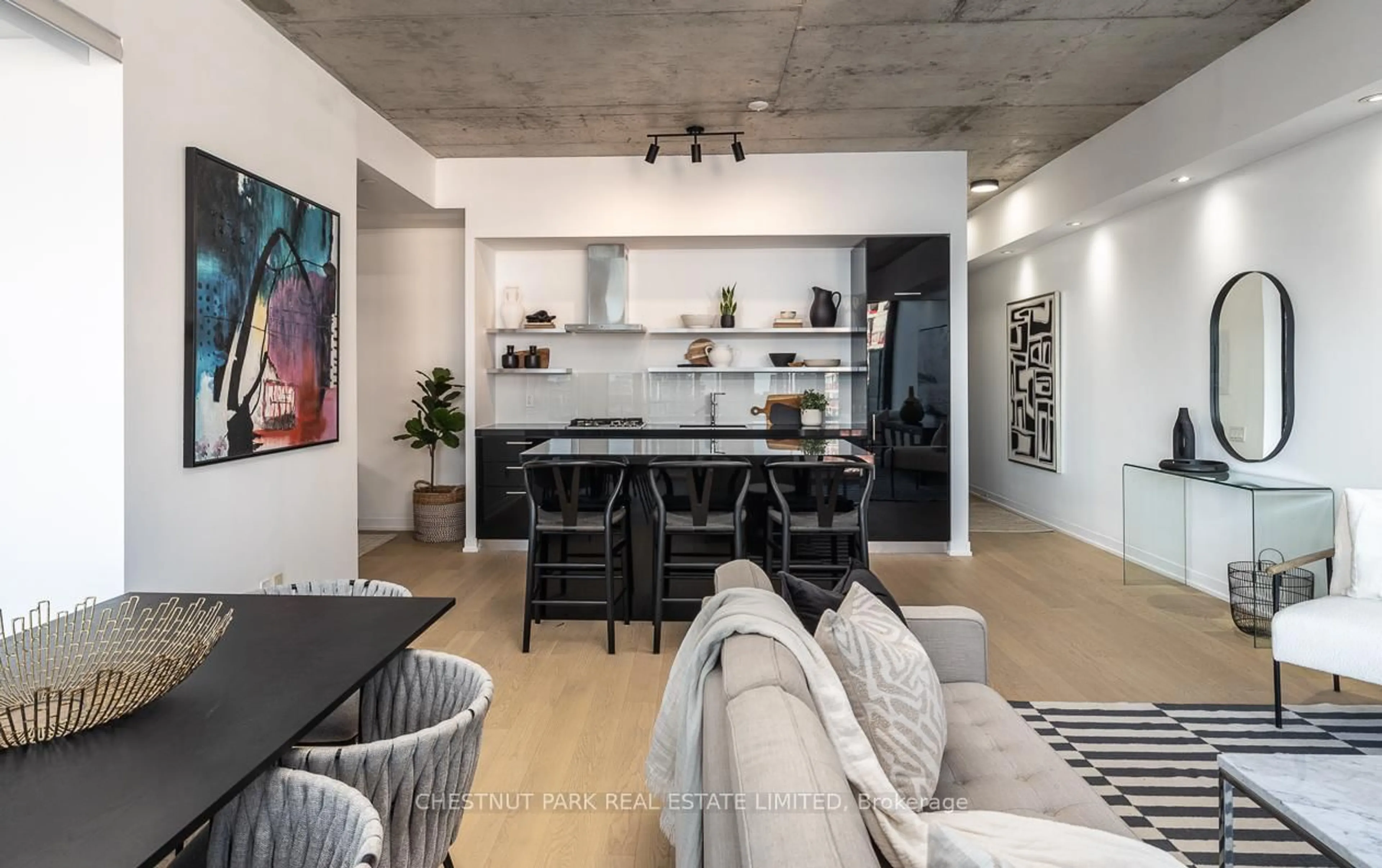 Open concept kitchen, cement floor for 560 King St #1014, Toronto Ontario M5V 0L6