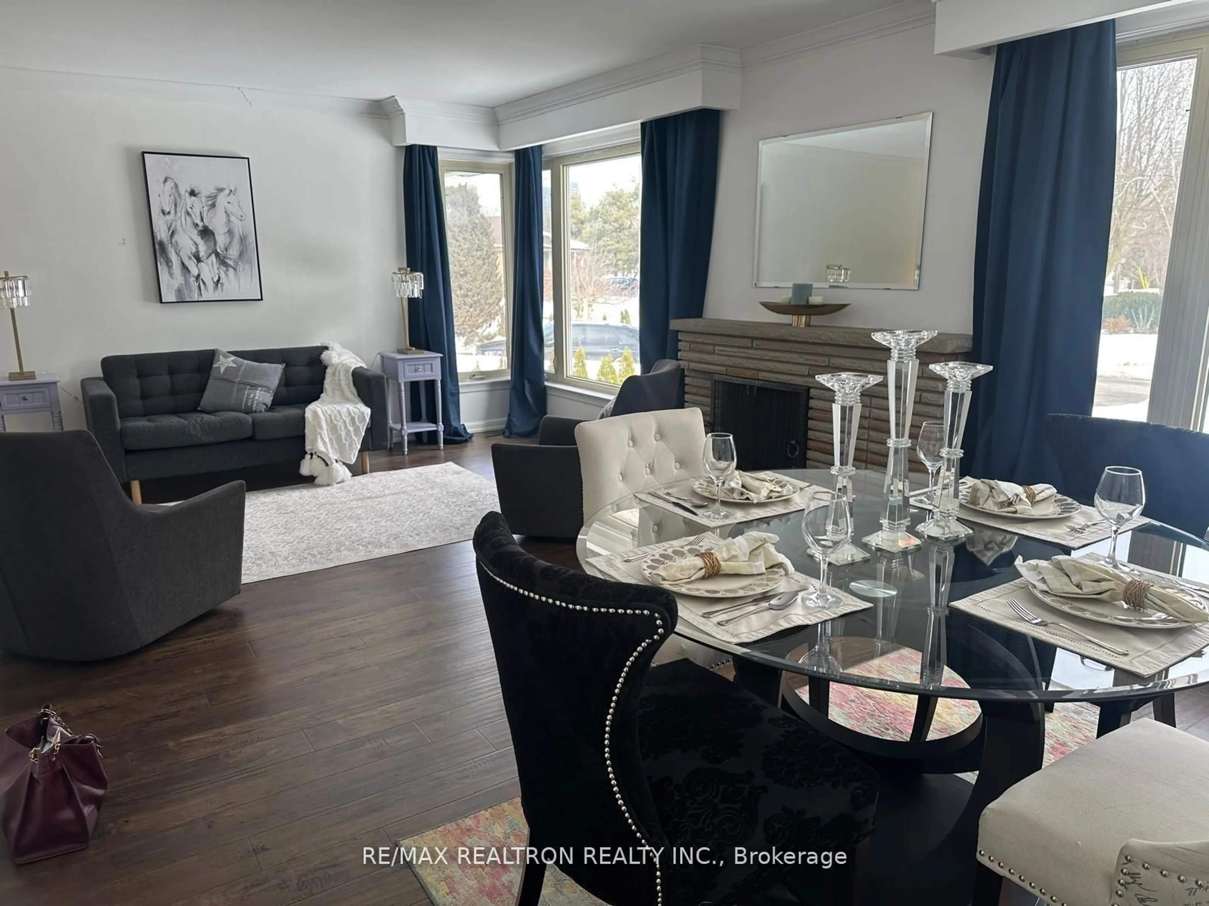 Living room with furniture, wood/laminate floor for 66 Claywood Rd, Toronto Ontario M2N 2R2