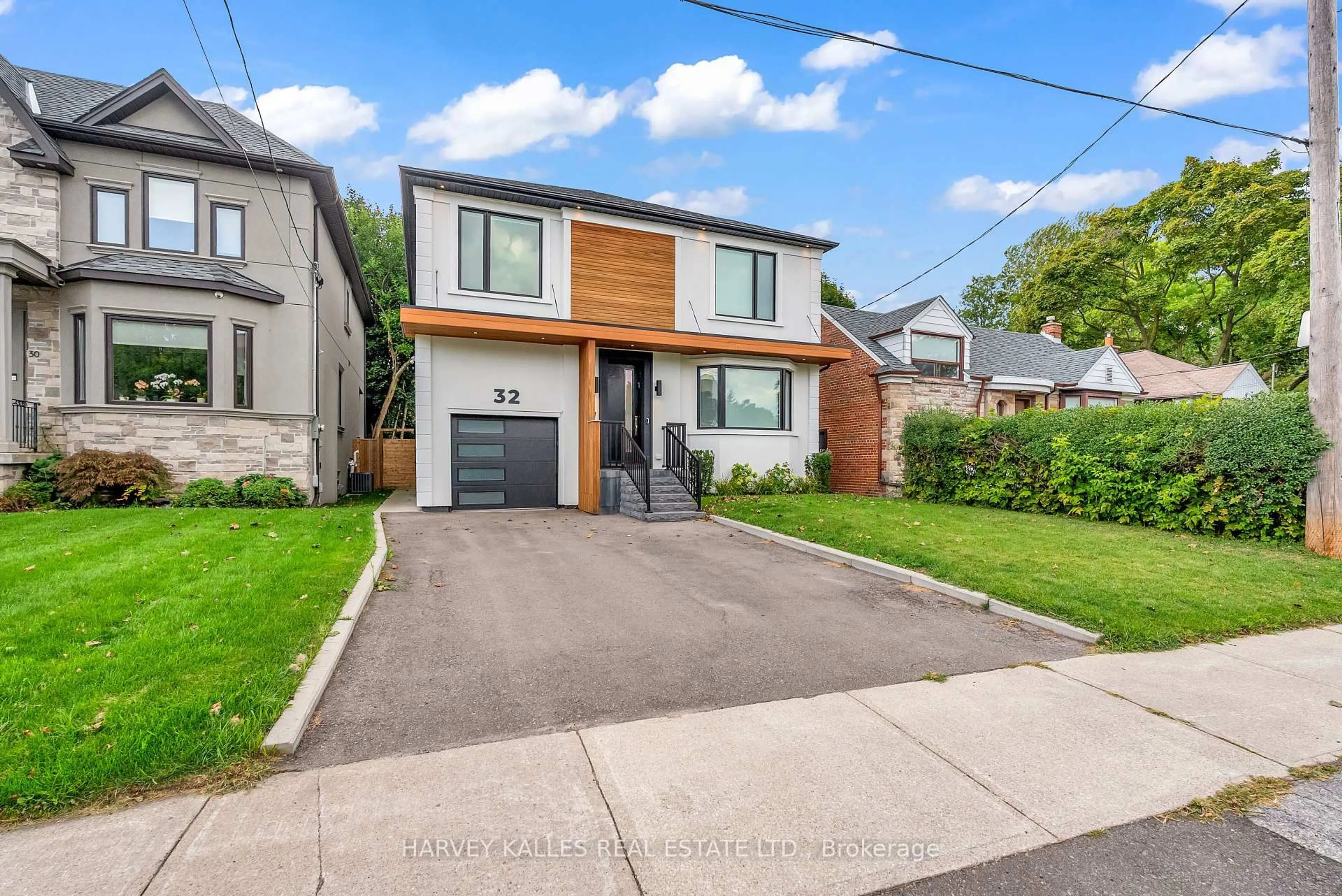 Home with brick exterior material, street for 32 Almont Rd, Toronto Ontario M3H 3E3