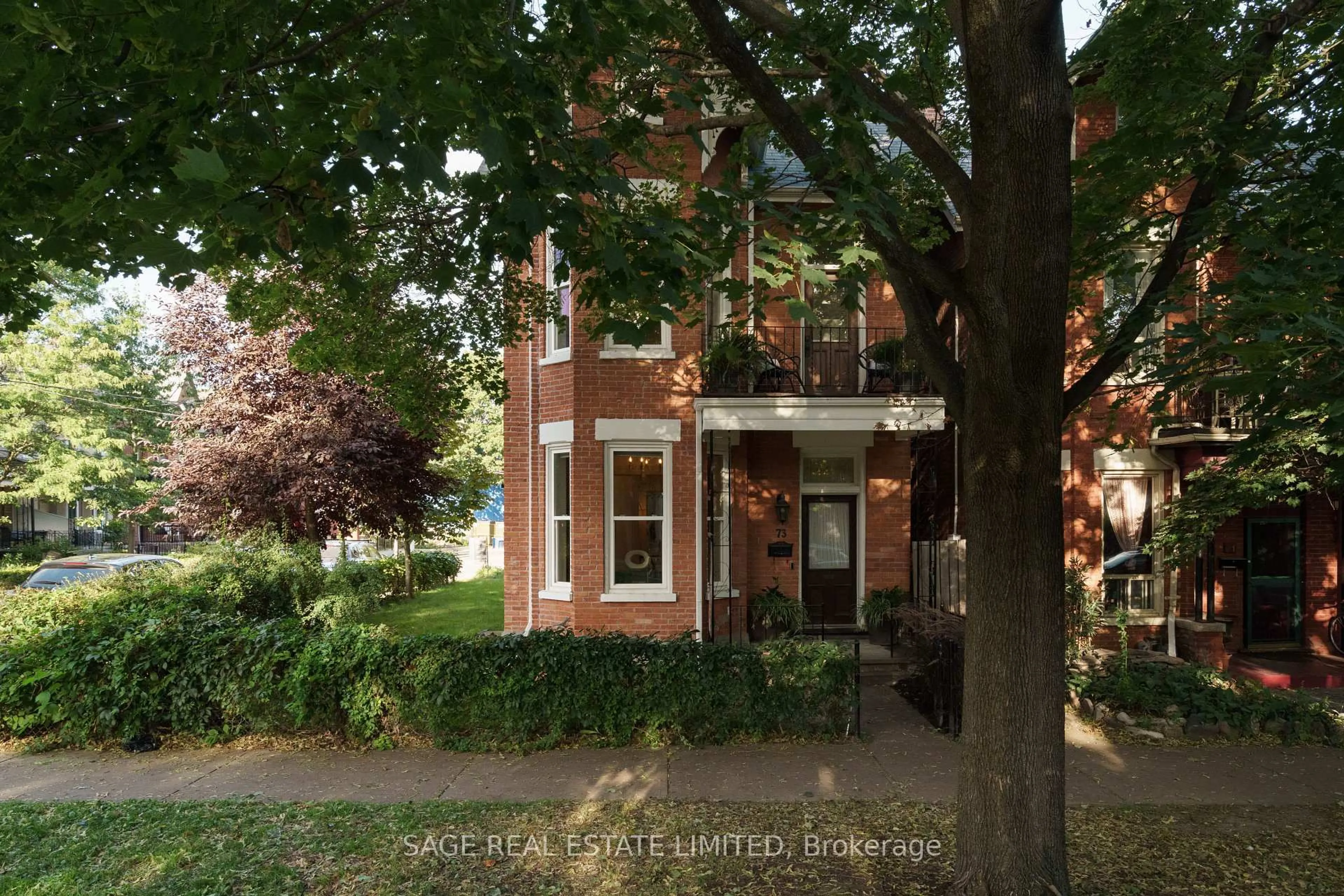 Home with brick exterior material, street for 73 Lakeview Ave, Toronto Ontario M6J 3B4