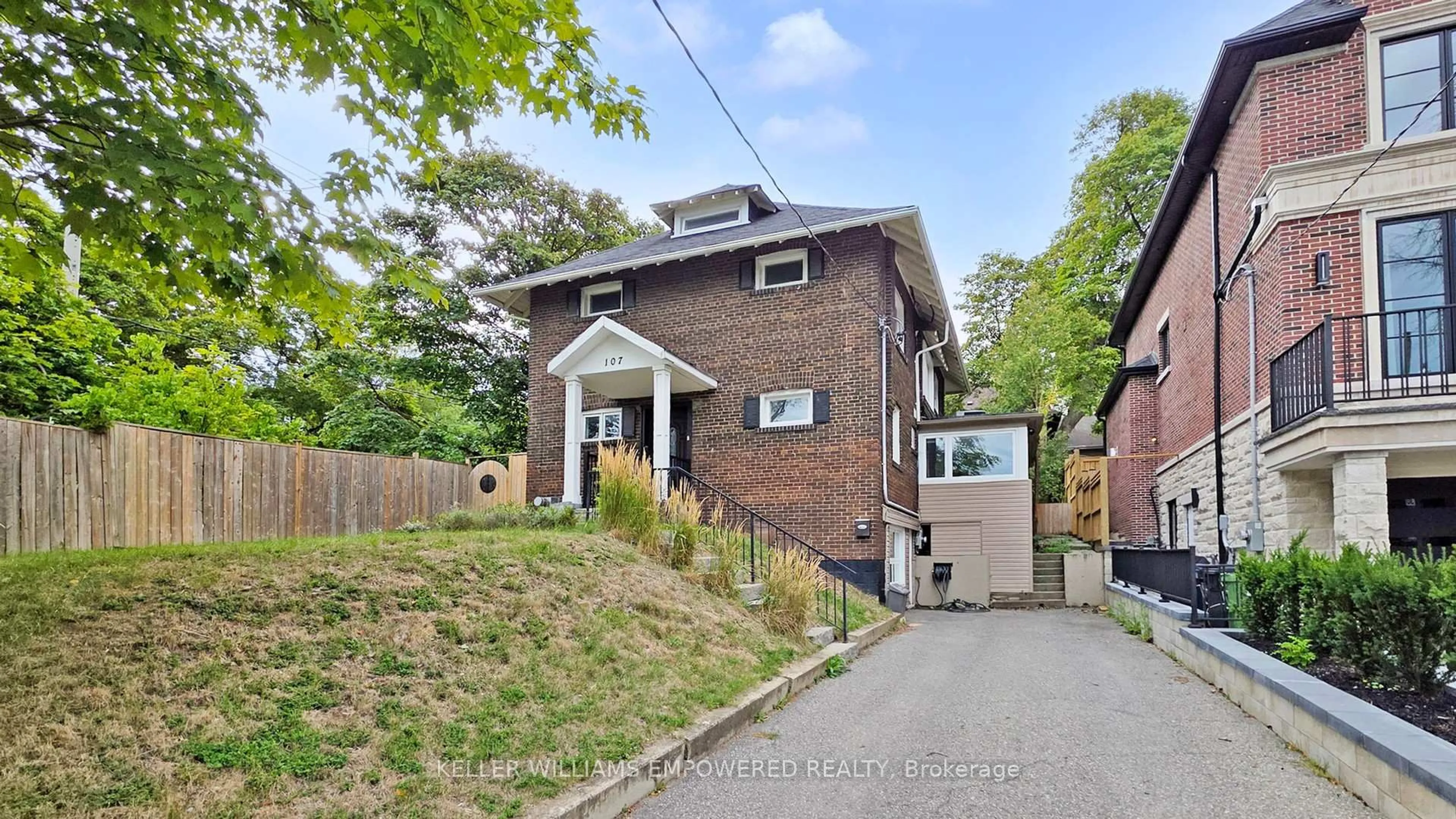 Home with brick exterior material, street for 107 Lawrence Cres, Toronto Ontario M4N 1N5