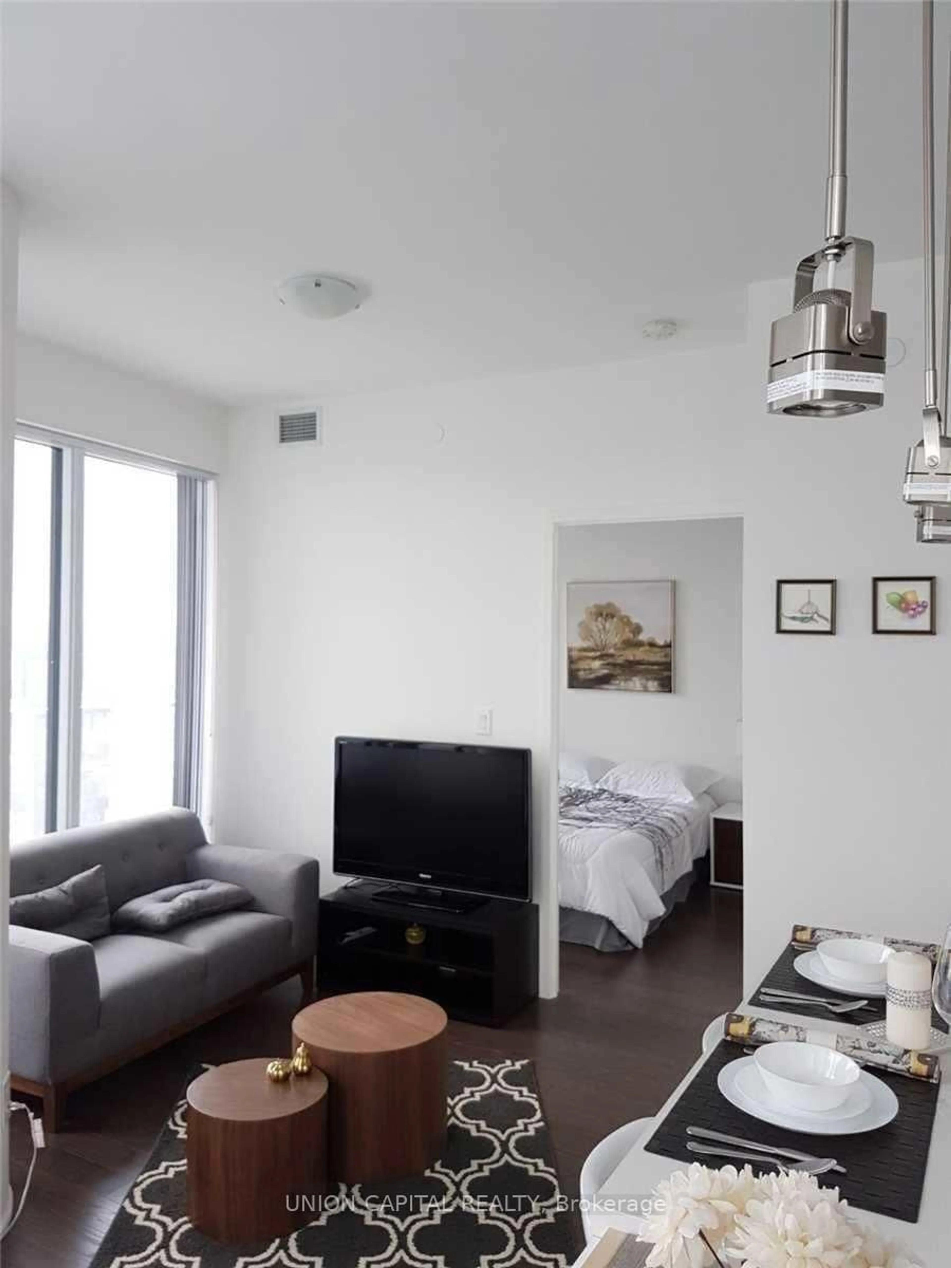 Living room with furniture, unknown for 88 Harbour St #7002, Toronto Ontario M5E 1X6