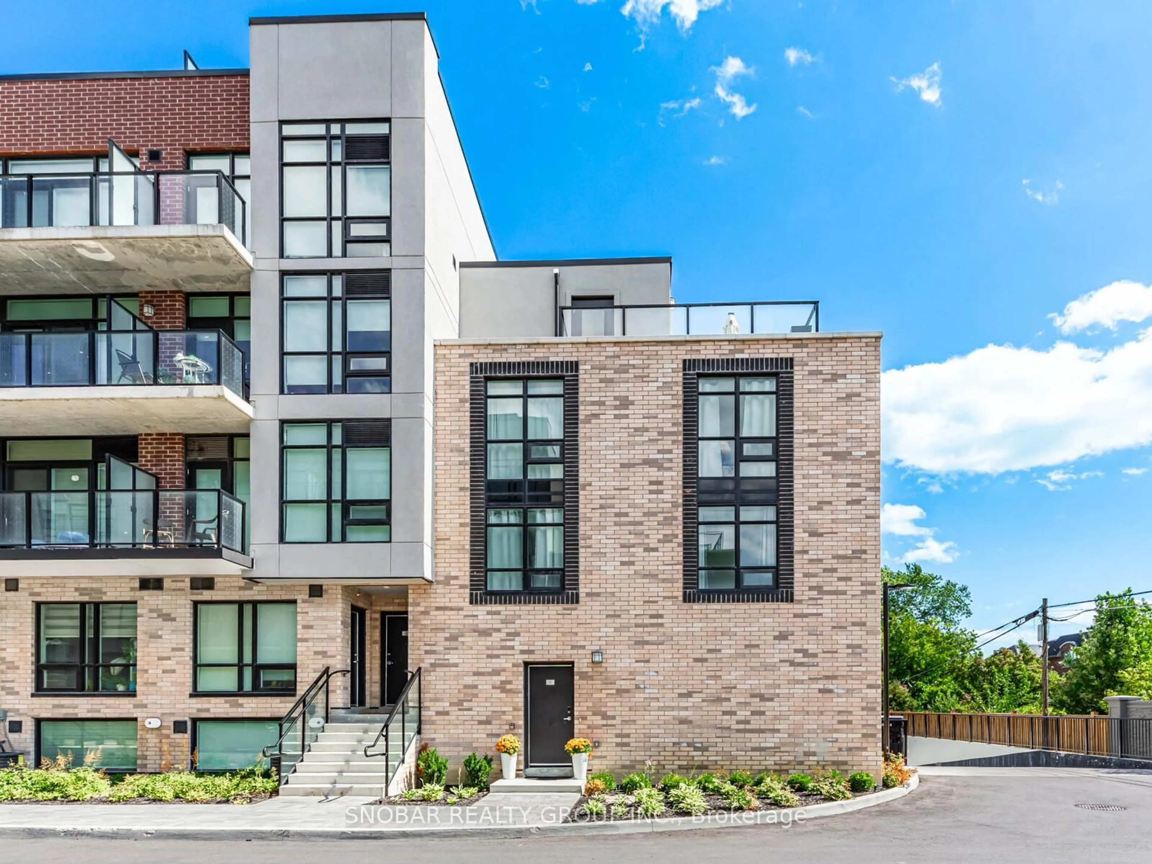 Home with brick exterior material, street for 861 Sheppard Ave #1, Toronto Ontario M3H 2T5