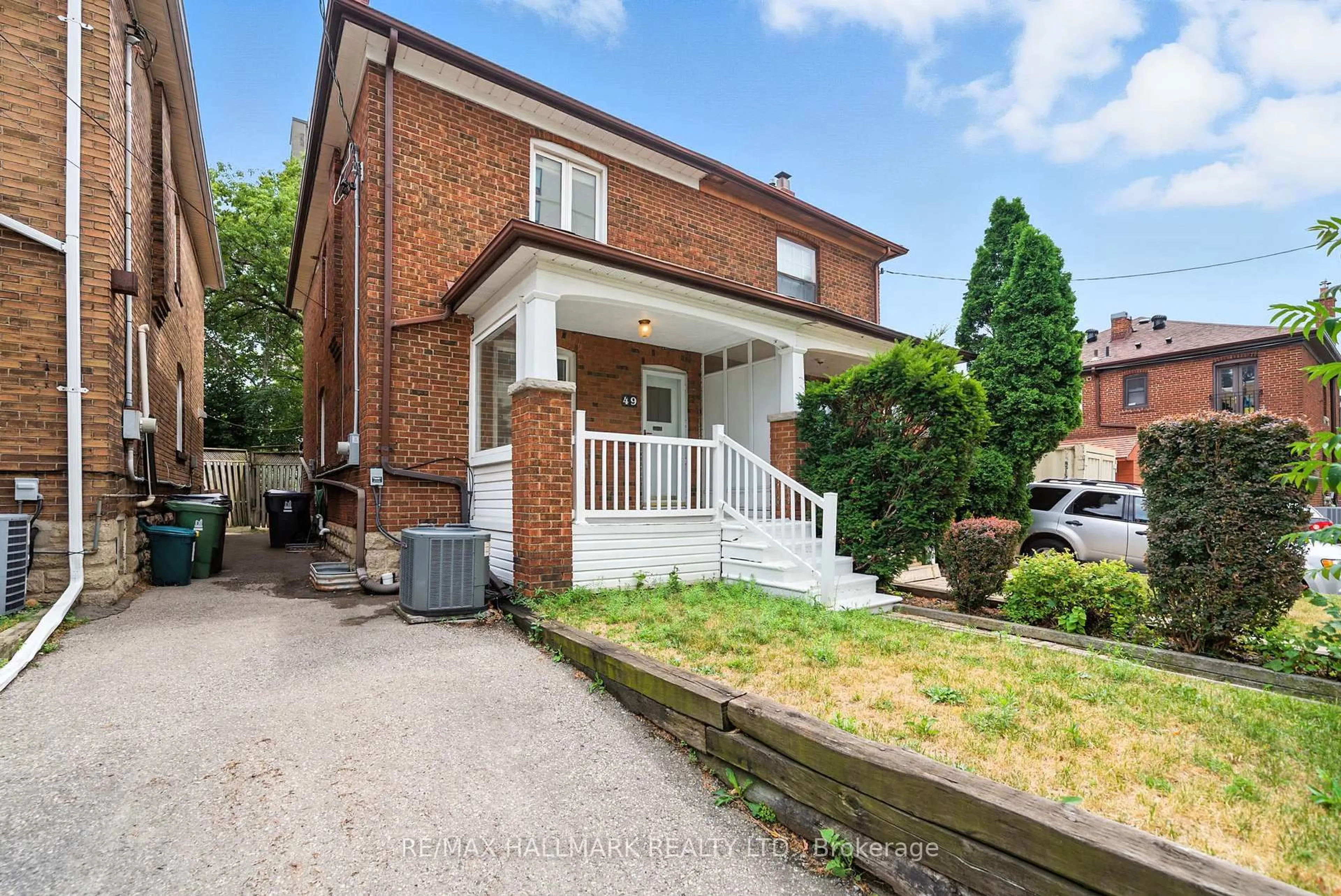 Home with brick exterior material, street for 49 Rawlinson Ave, Toronto Ontario M4P 2N1