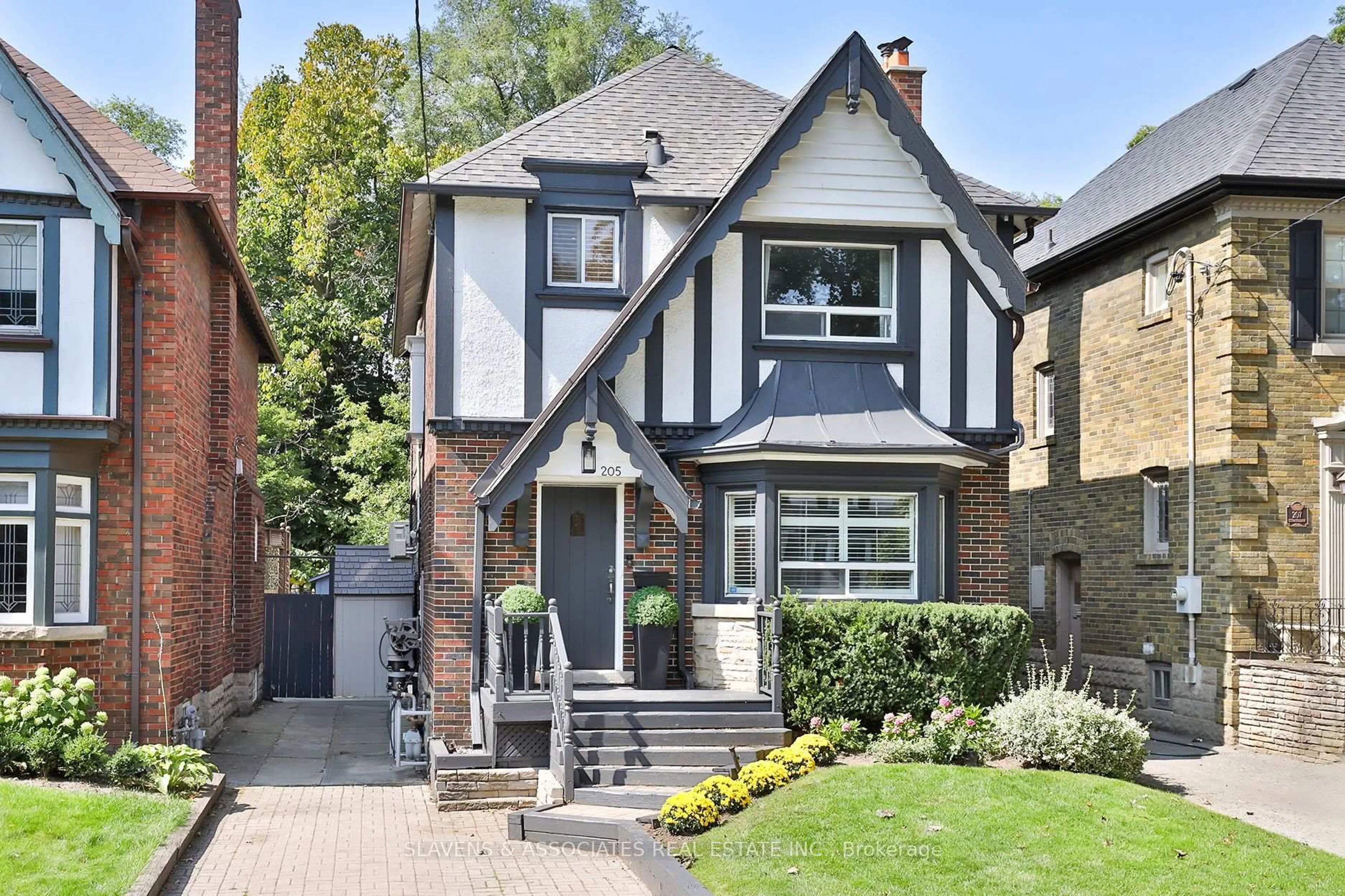 Home with brick exterior material, street for 205 Strathearn Rd, Toronto Ontario M6C 1S5