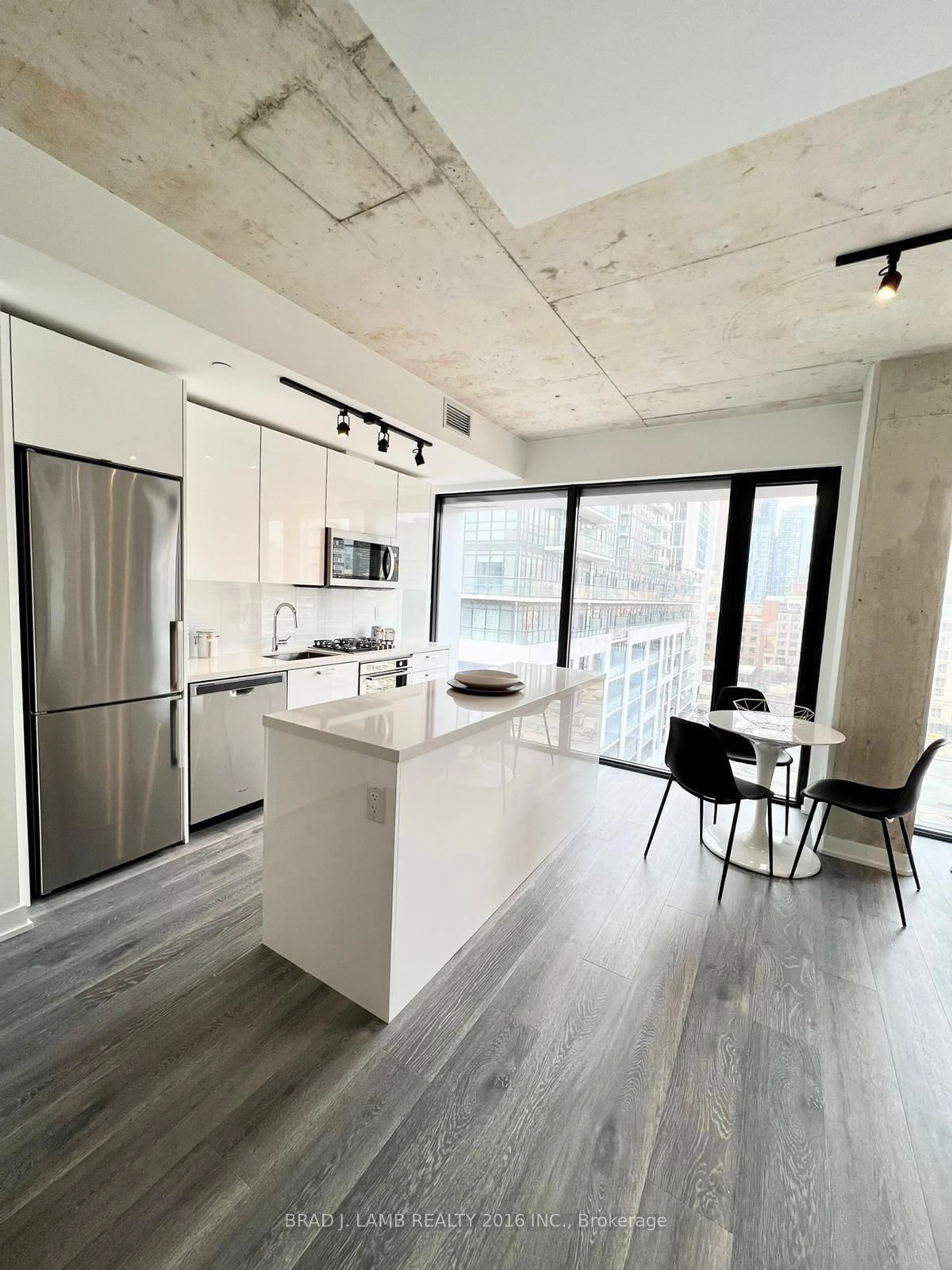Open concept kitchen, cement floor for 55 Ontario St #812, Toronto Ontario M5A 0T8