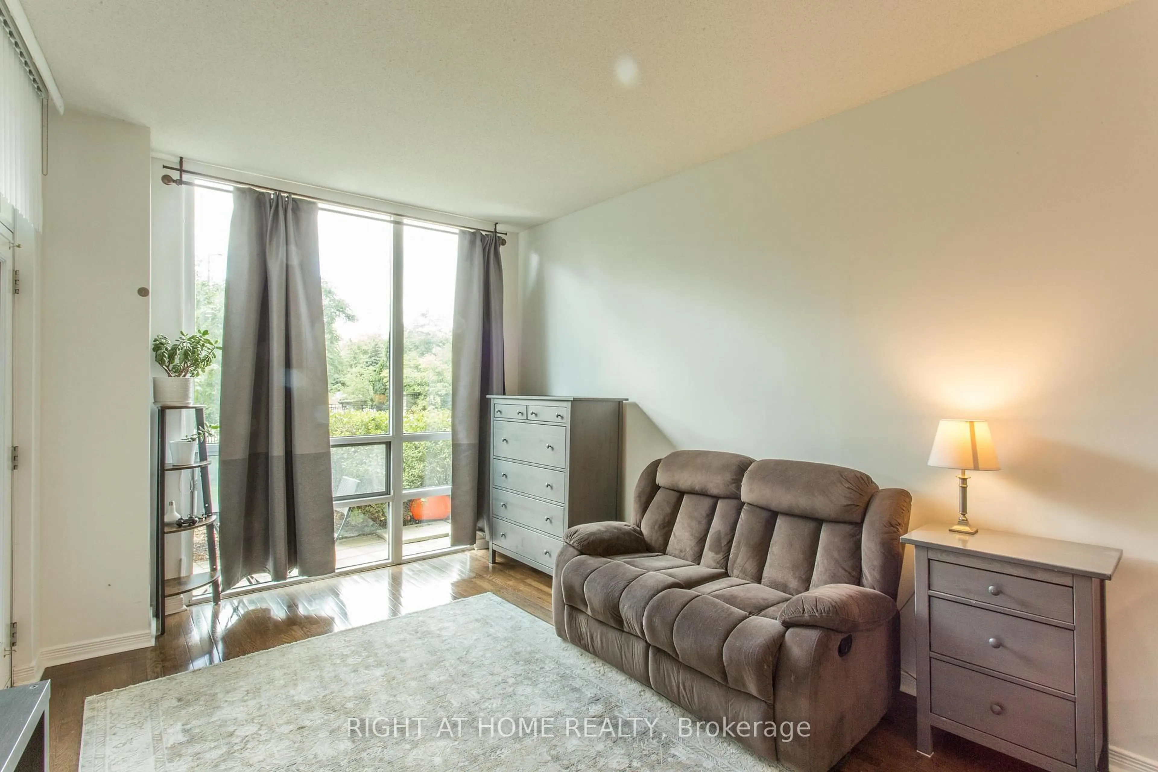 Living room with furniture, unknown for 503 Beecroft Rd #106, Toronto Ontario M2N 0A2