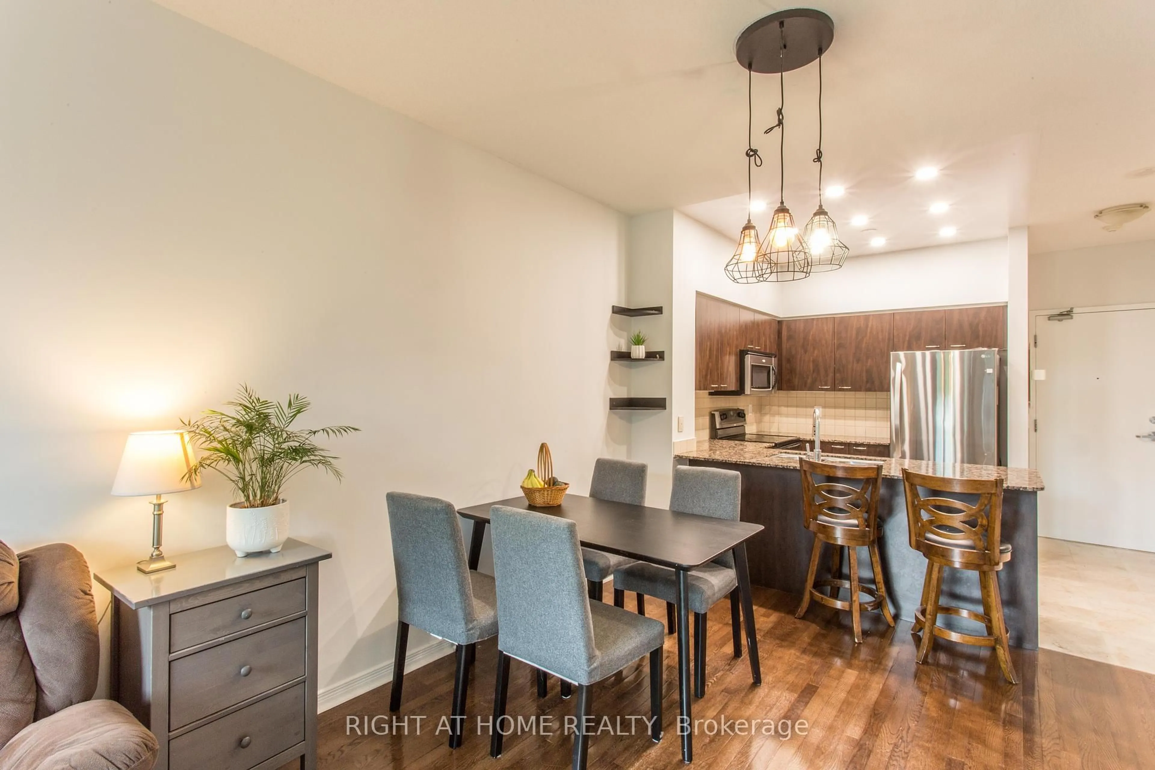 Open concept kitchen, wood/laminate floor for 503 Beecroft Rd #106, Toronto Ontario M2N 0A2