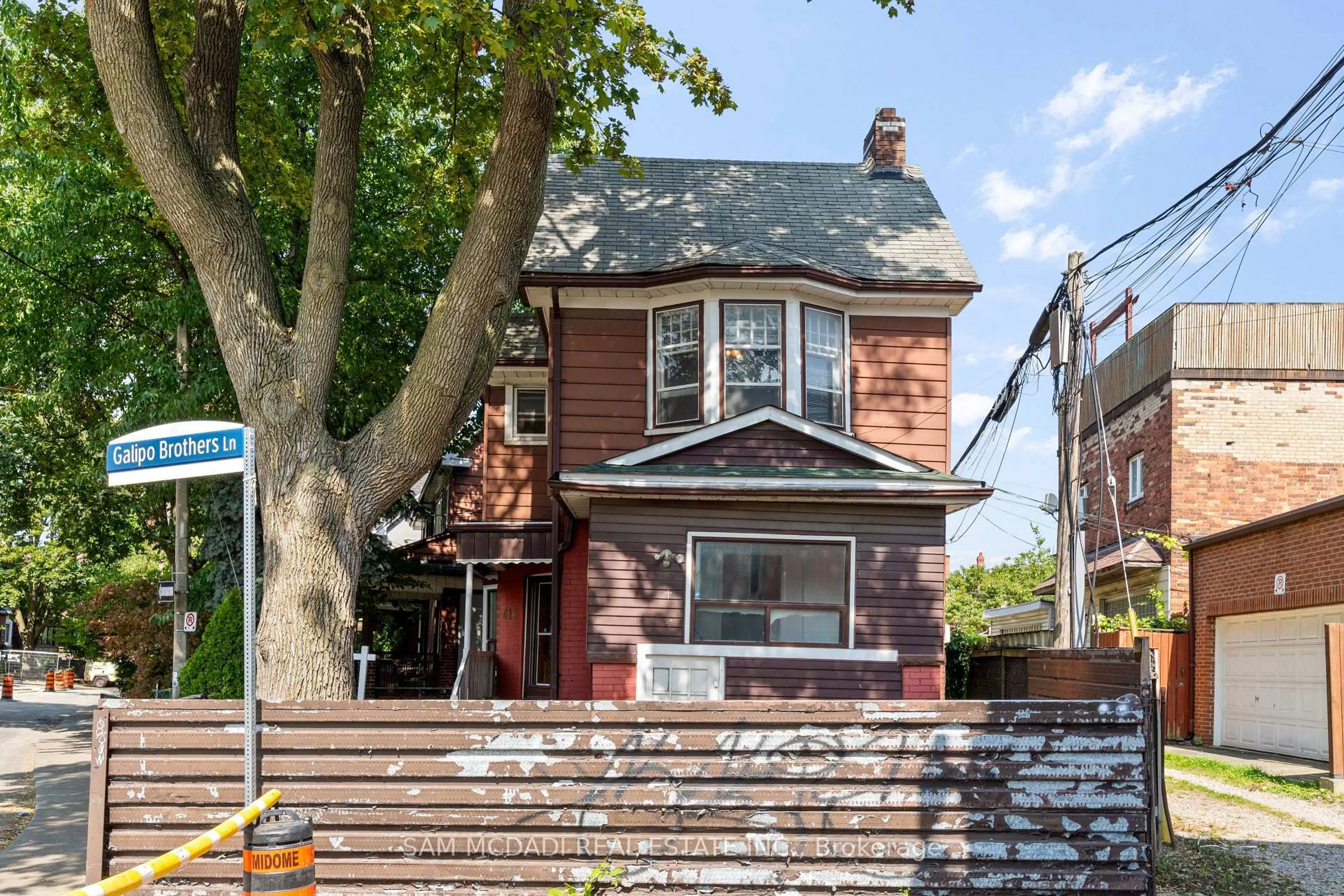 Home with brick exterior material, street for 415 Crawford St, Toronto Ontario M6G 3J7