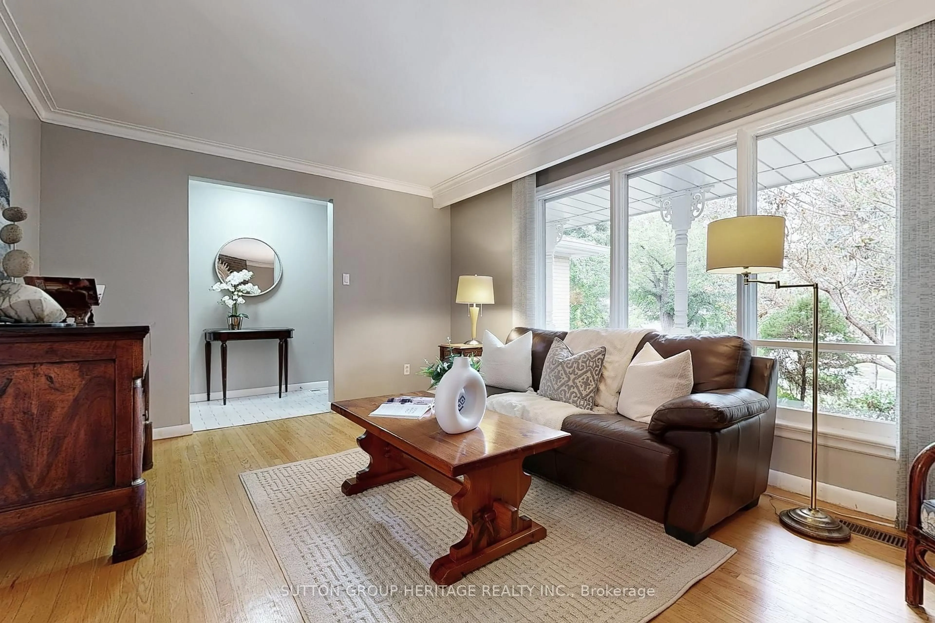 Living room with furniture, wood/laminate floor for 17 Brenham Cres, Toronto Ontario M2M 2K9
