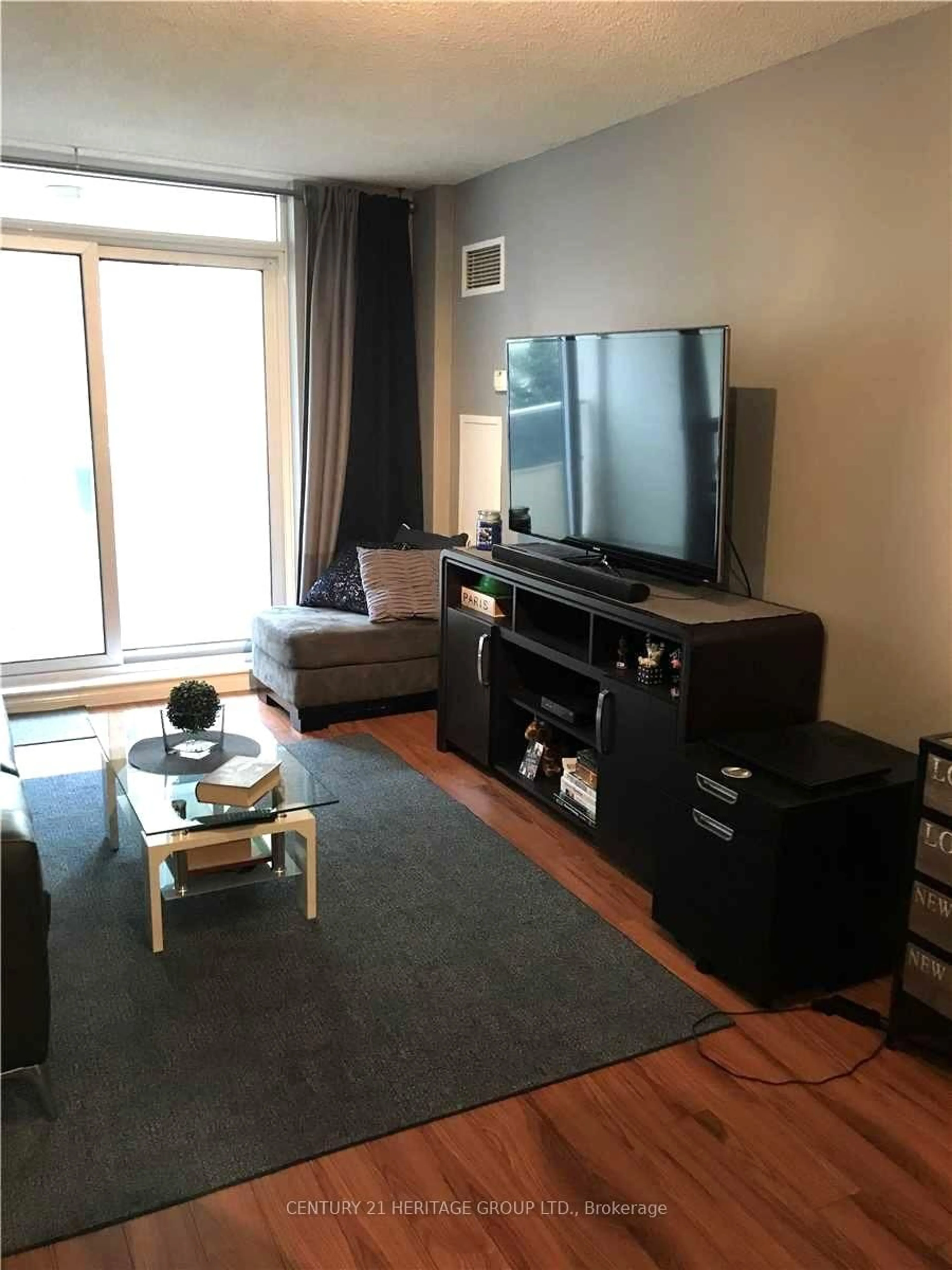 Living room with furniture, wood/laminate floor for 8 Rean Dr #404, Toronto Ontario M2K 3B9