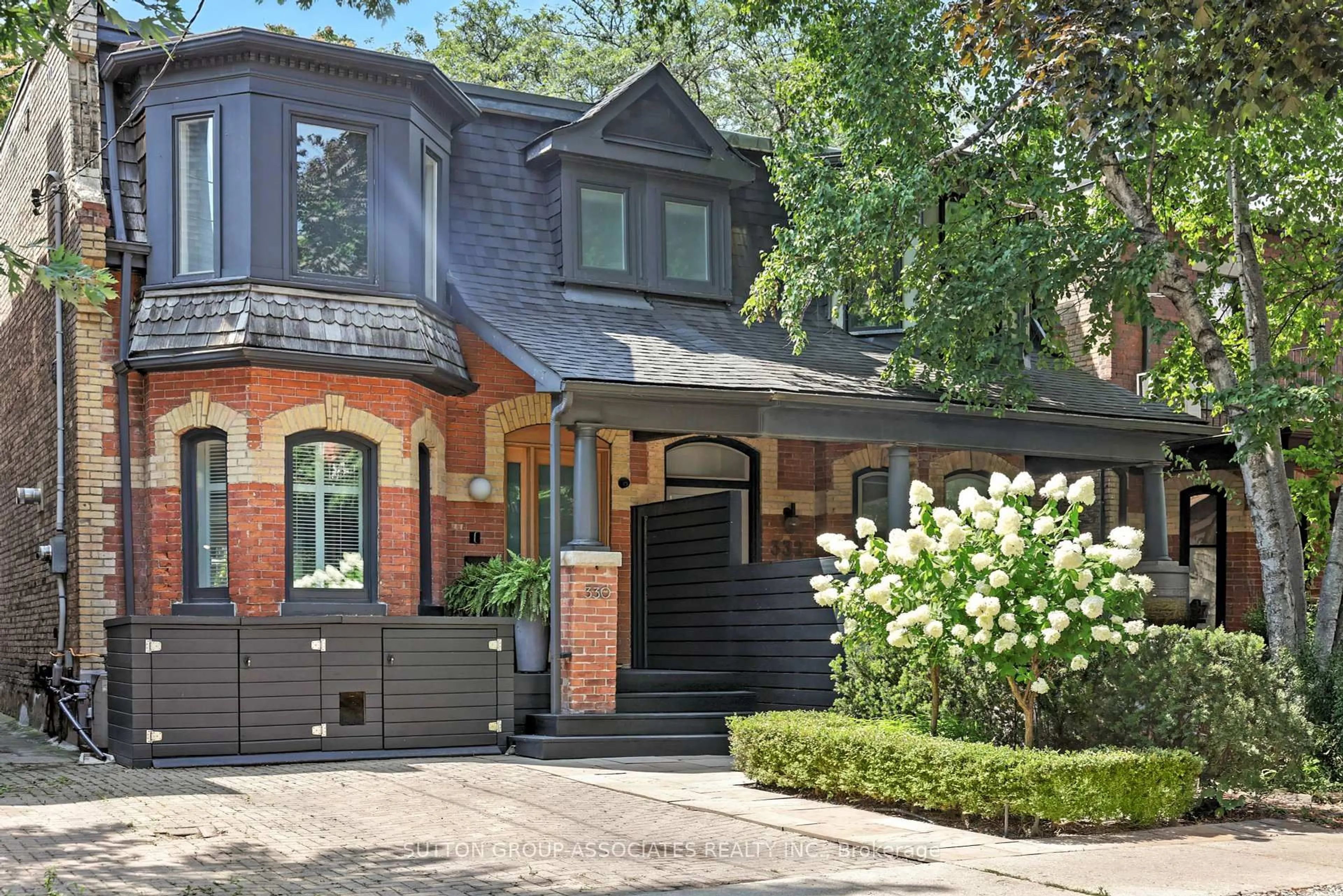 Home with brick exterior material, street for 330 Markham St, Toronto Ontario M6G 2K9