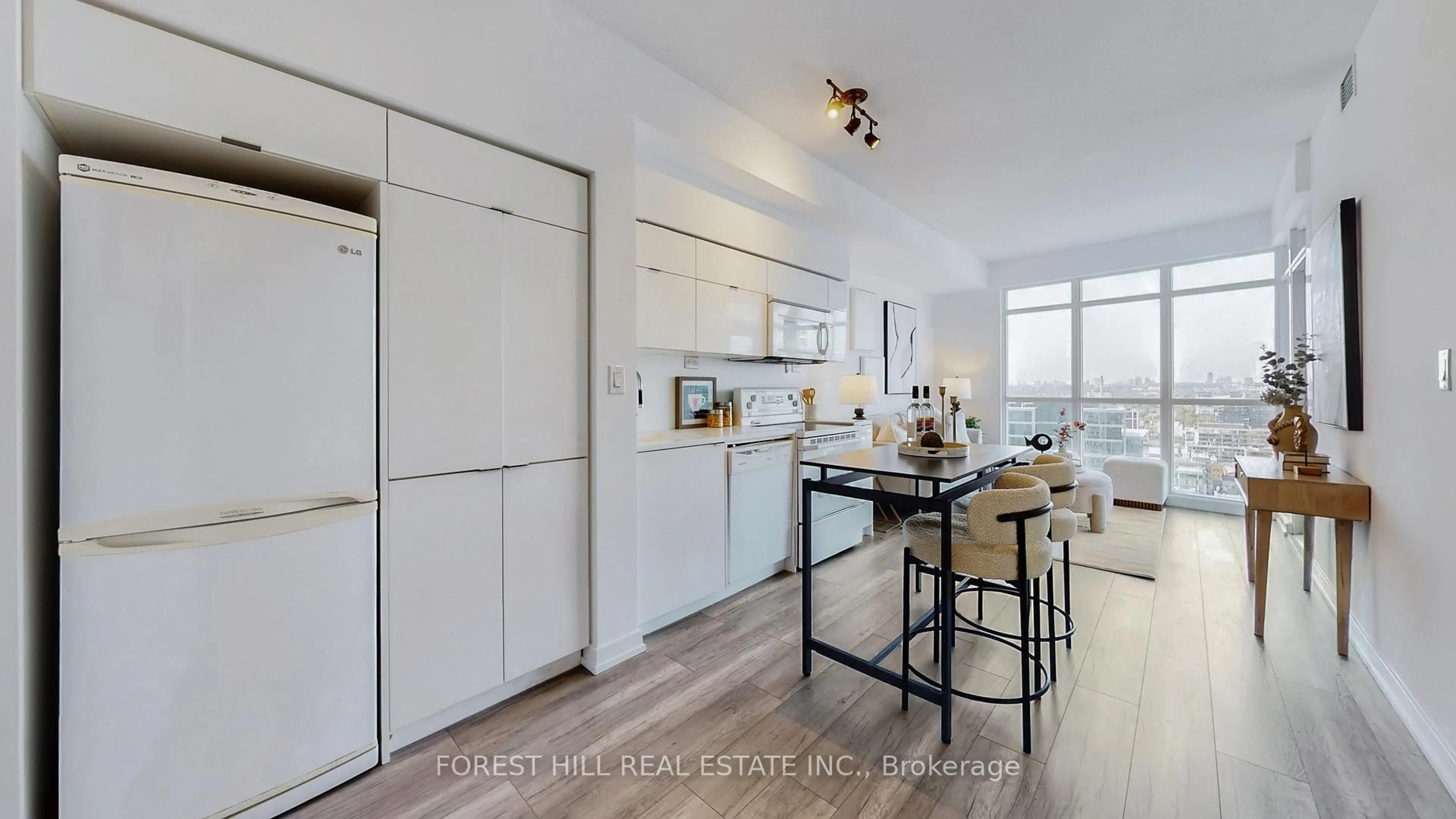 Open concept kitchen, wood/laminate floor for 21 Iceboat Terr #3101, Toronto Ontario M5V 4A9
