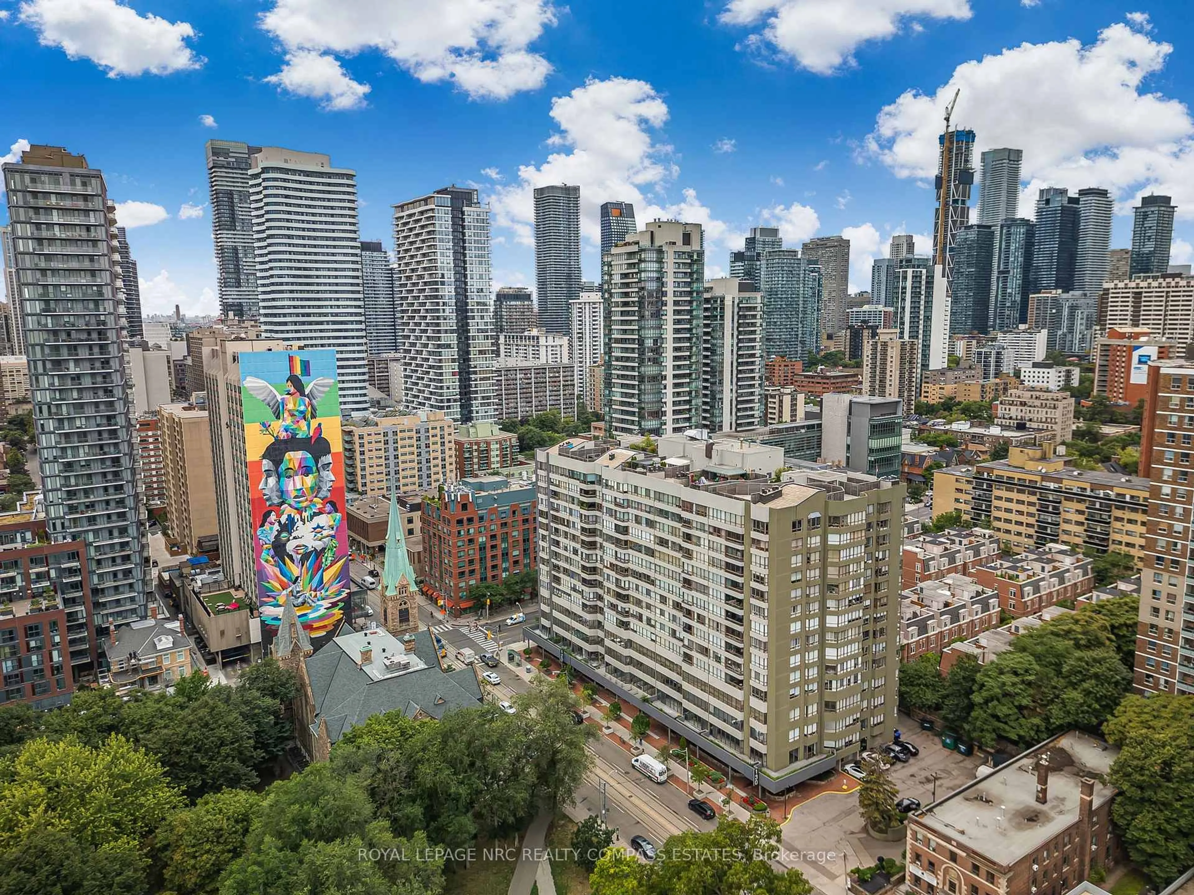A pic from outside/outdoor area/front of a property/back of a property/a pic from drone, city buildings view from balcony for 130 Carlton St #810, Toronto Ontario M5A 4K3