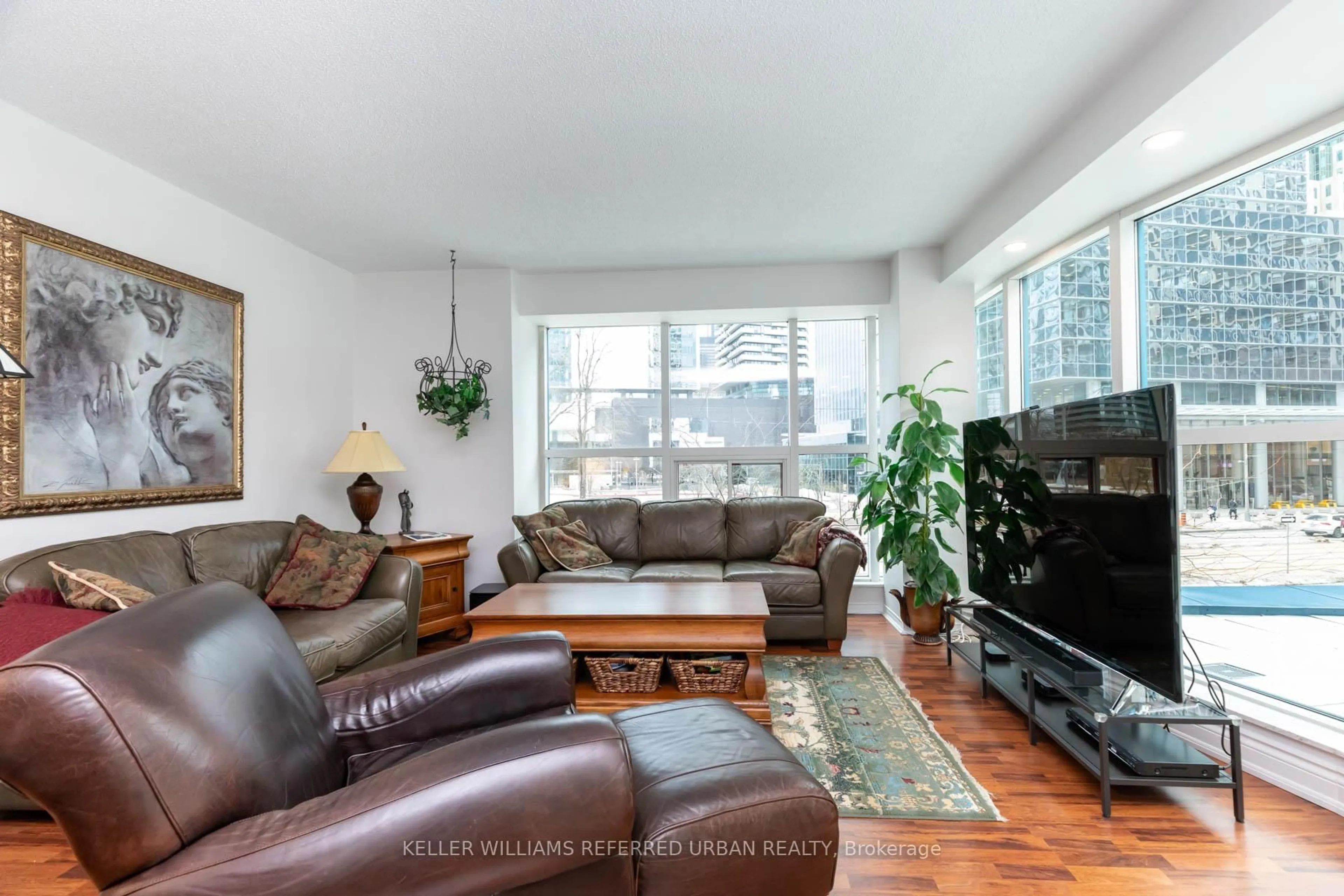 Living room with furniture, unknown for 77 Harbour Sq #302, Toronto Ontario M5J 2S2