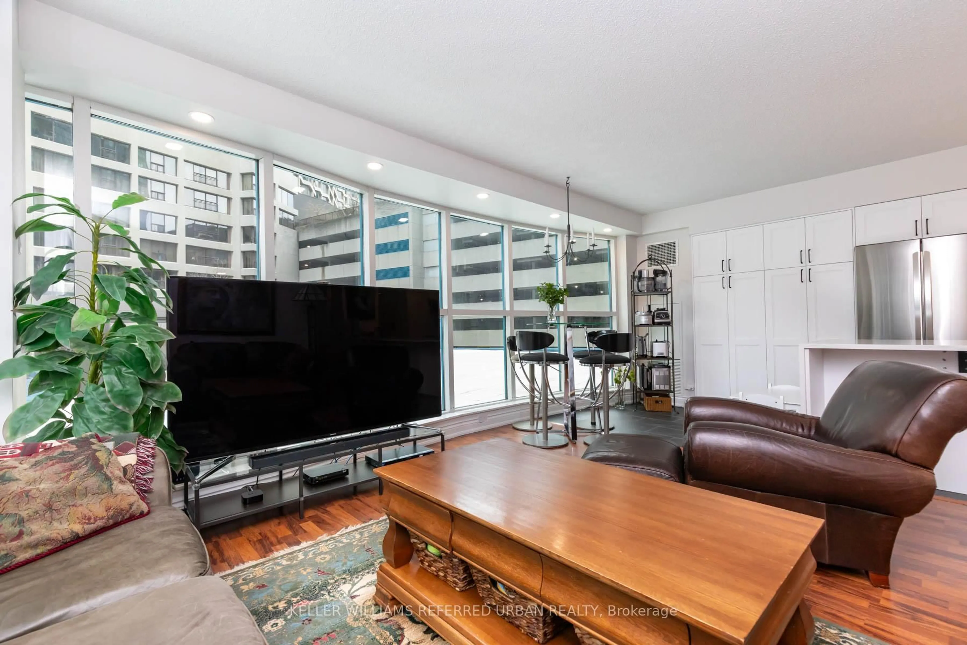 Living room with furniture, unknown for 77 Harbour Sq #302, Toronto Ontario M5J 2S2