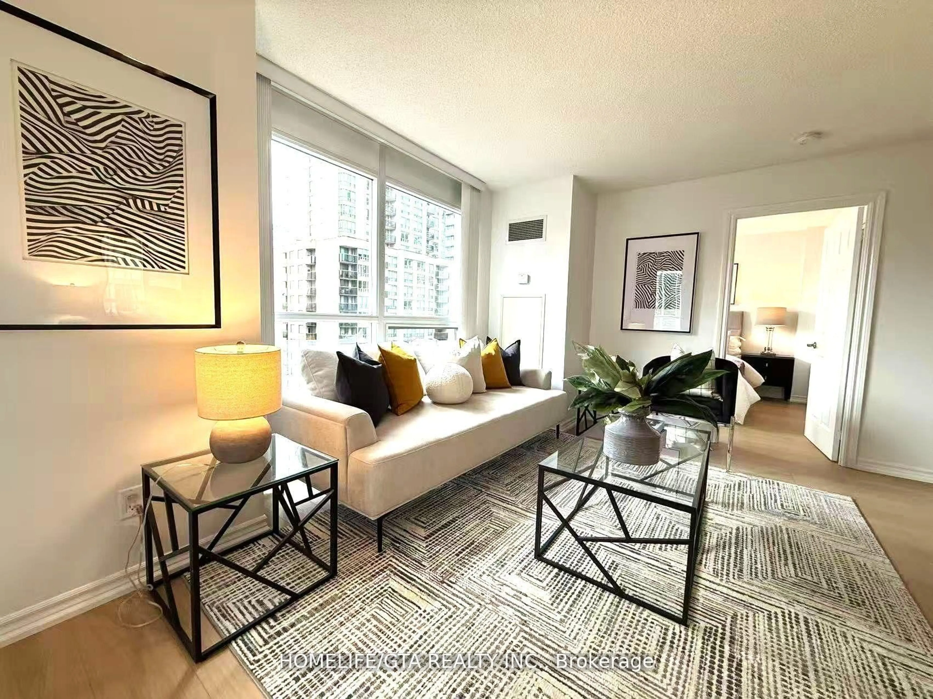 Living room with furniture, carpet floor for 761 Bay St #1509, Toronto Ontario M5G 2R2