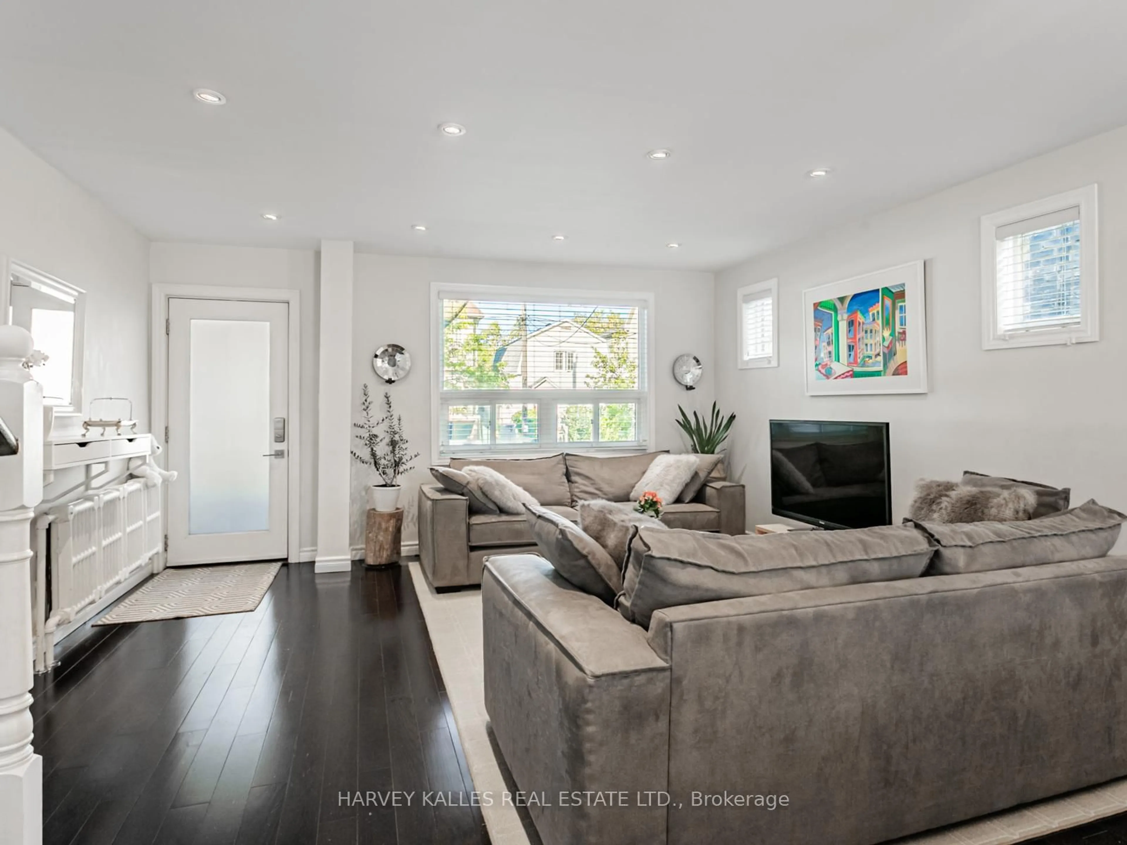 Living room with furniture, wood/laminate floor for 365 Atlas Ave, Toronto Ontario M6C 3P8