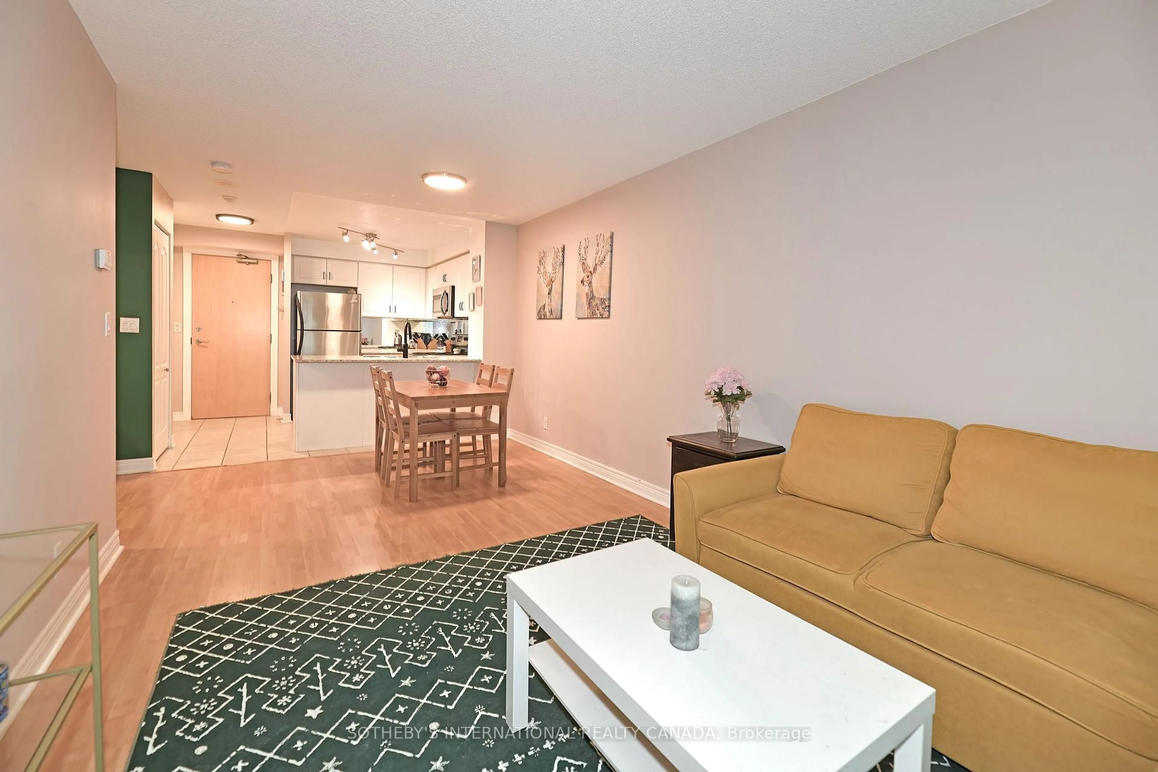 Living room with furniture, unknown for 212 Eglinton Ave #307, Toronto Ontario M4P 0A3