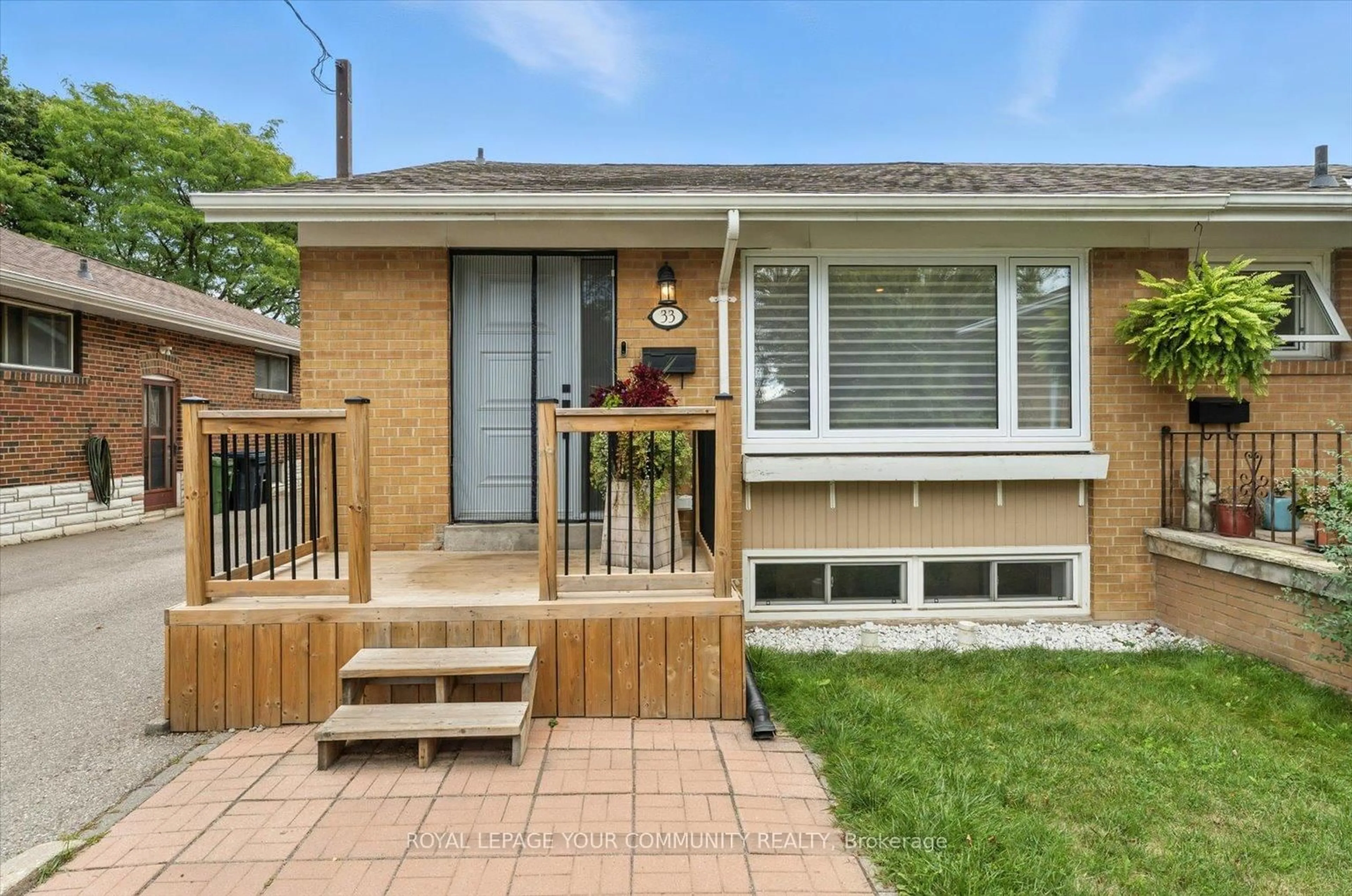 Home with brick exterior material, street for 33 Murellen Cres, Toronto Ontario M4A 2K6