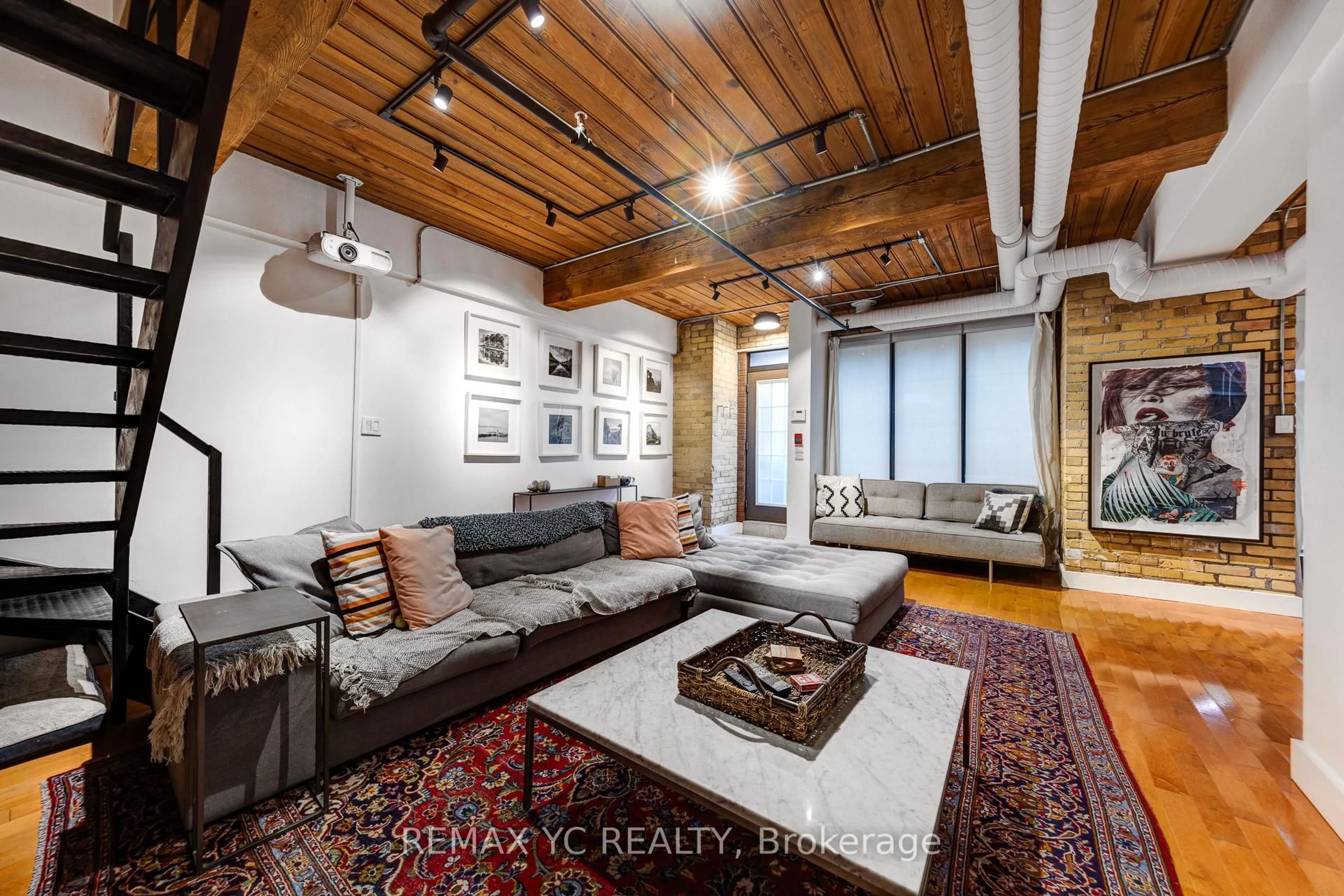 Living room with furniture, unknown for 436 Wellington St #105, Toronto Ontario M5V 1E3