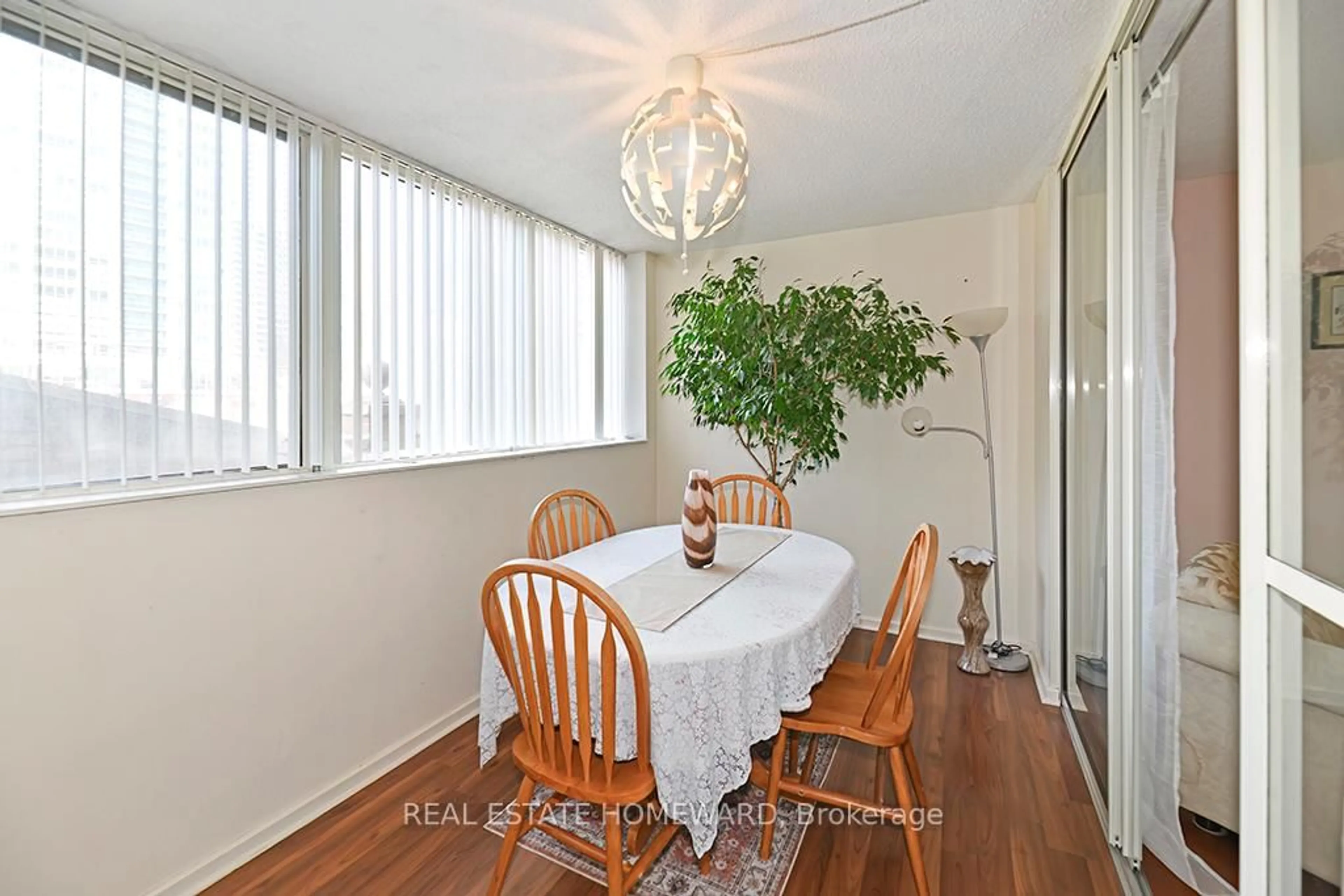 Dining room, wood/laminate floor for 15 Maitland Pl #204, Toronto Ontario M4Y 2X3