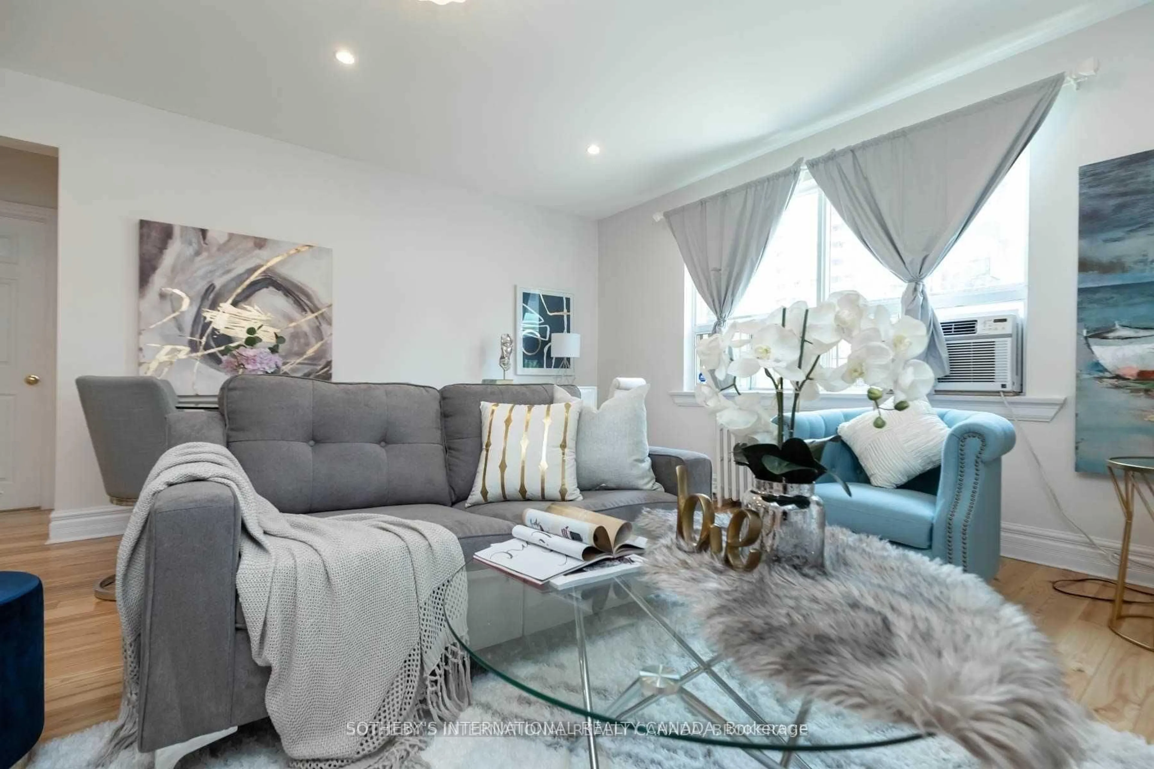 Living room with furniture, unknown for 35 Raglan Ave #108, Toronto Ontario M6C 2K7
