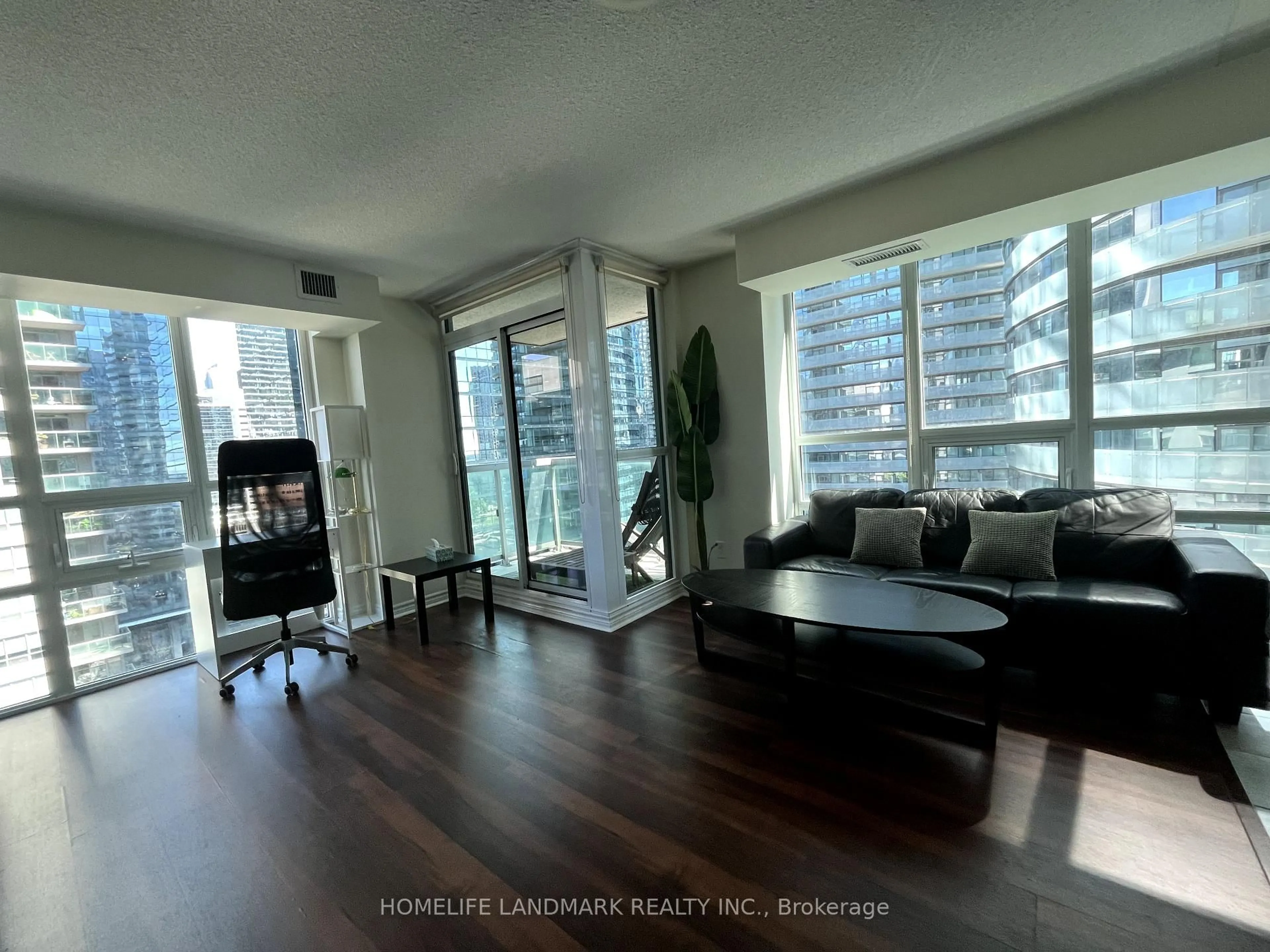 Living room with furniture, wood/laminate floor for 19 Grand Trunk Cres #1706, Toronto Ontario M5J 3A3