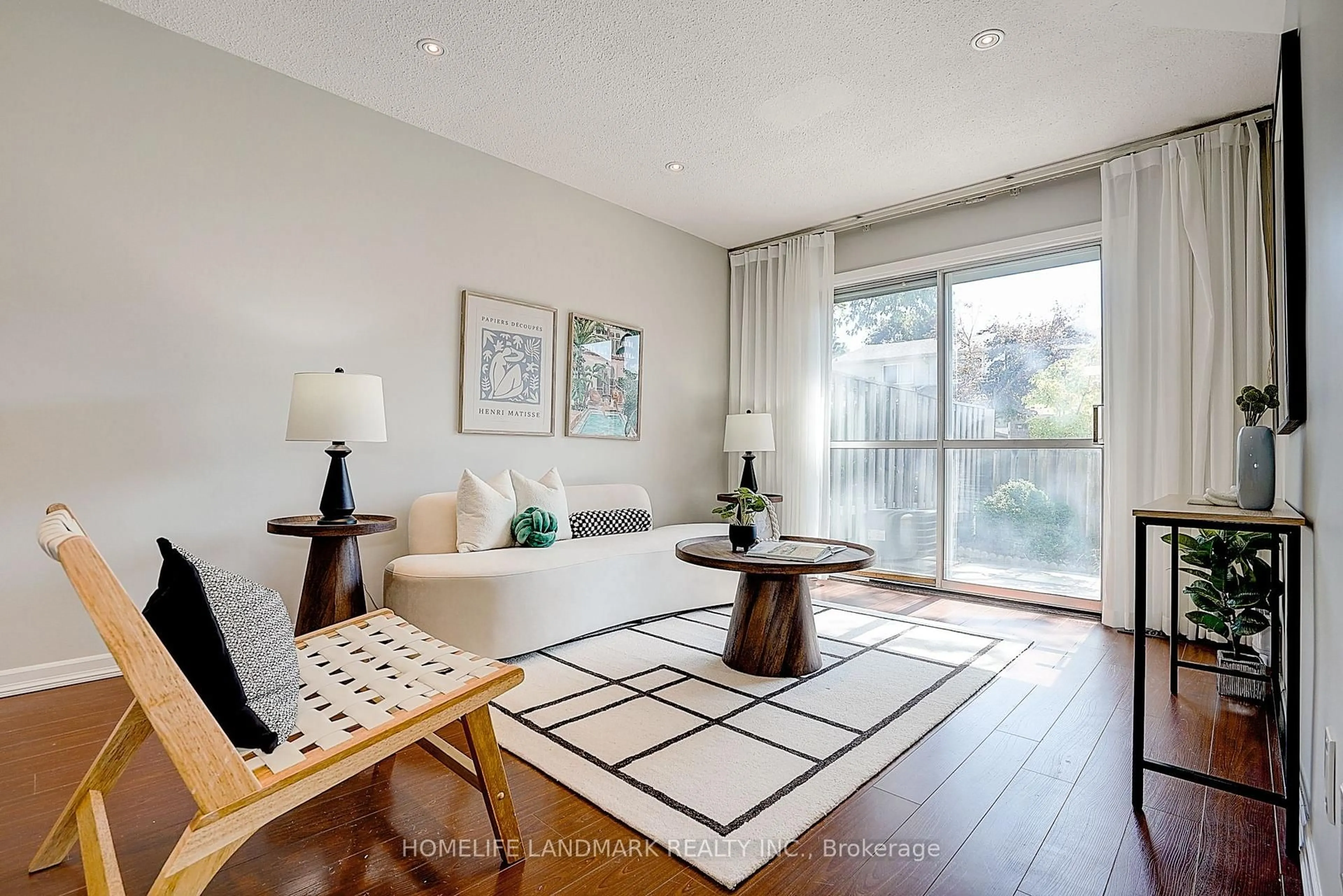 Living room with furniture, wood/laminate floor for 25 Bracken Fernway, Toronto Ontario M2J 4L5