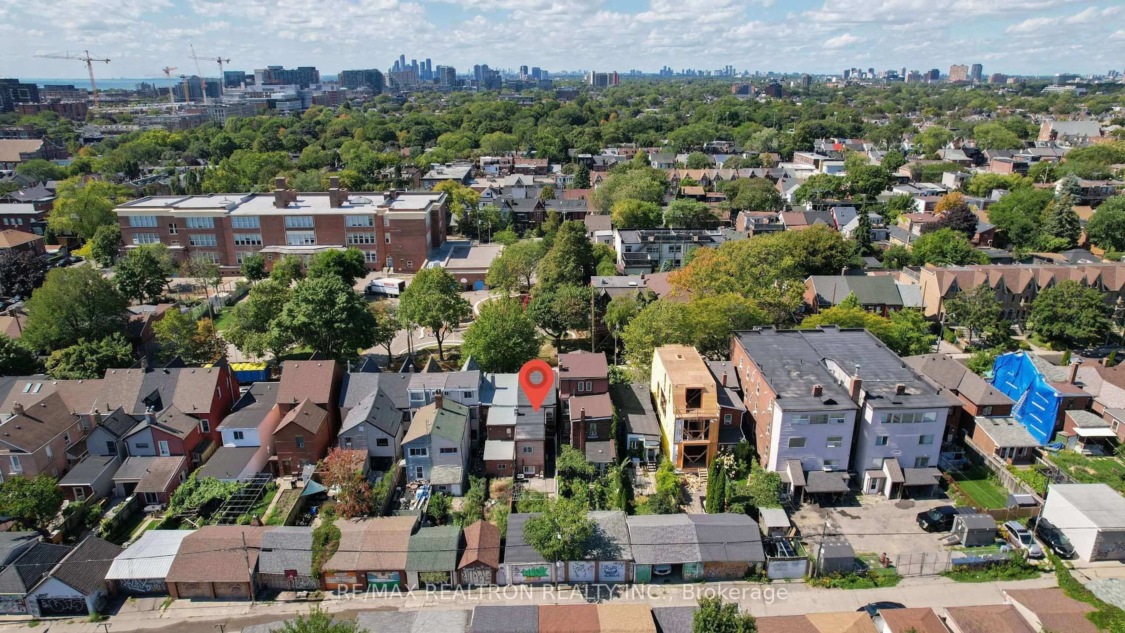 A pic from outside/outdoor area/front of a property/back of a property/a pic from drone, city buildings view from balcony for 99 Euclid Ave, Toronto Ontario M6J 2J8