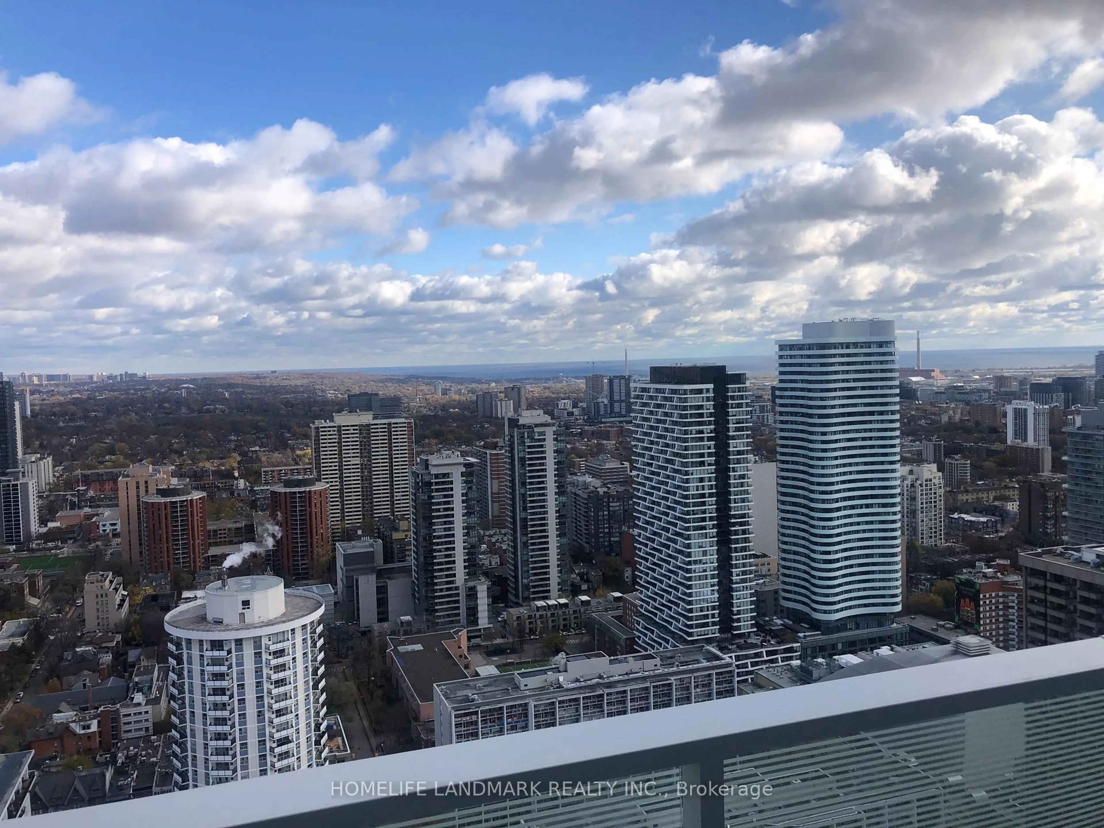 A pic from outside/outdoor area/front of a property/back of a property/a pic from drone, city buildings view from balcony for 501 Yonge St #4007, Toronto Ontario M4Y 0G8