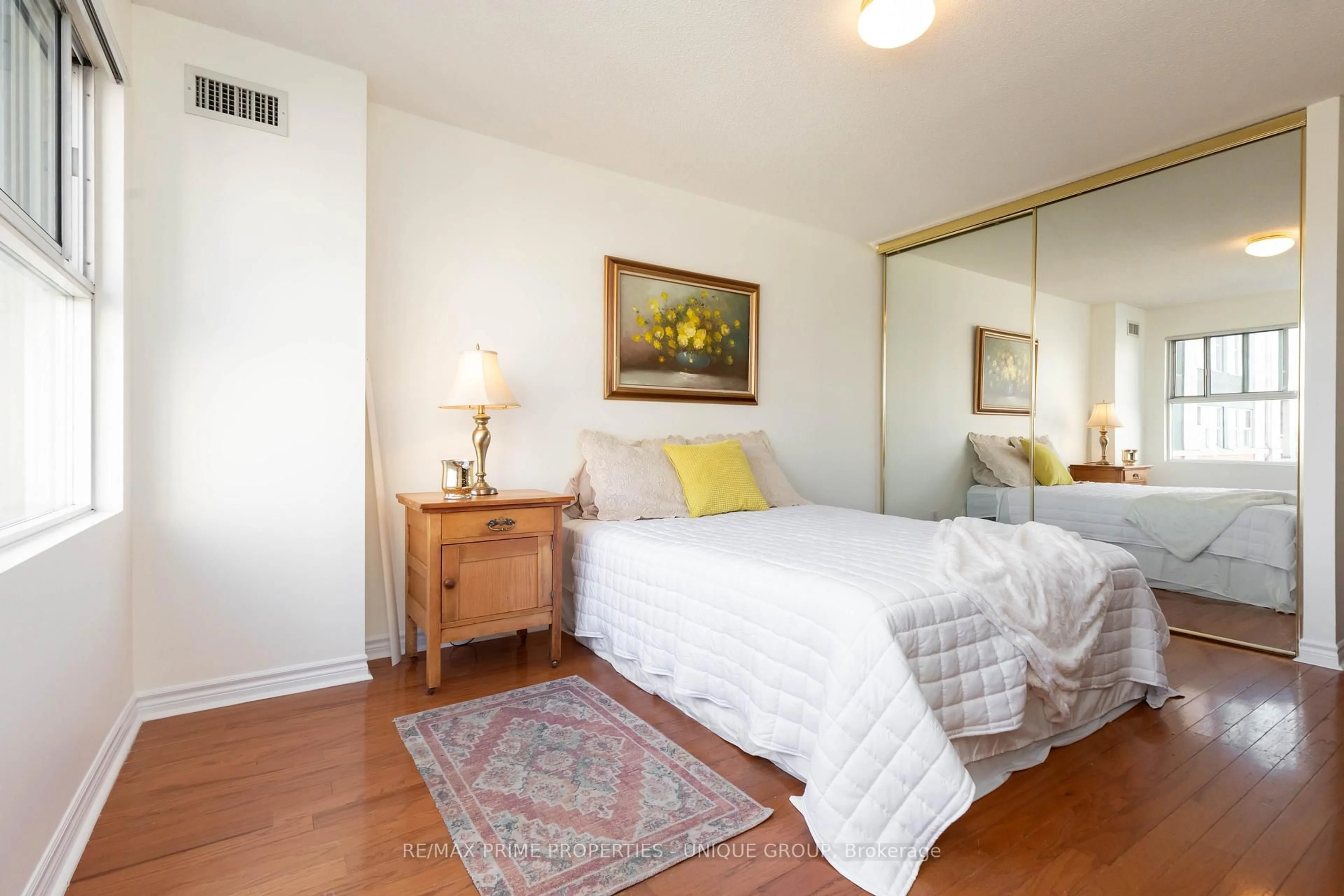 Bedroom with bed, wood/laminate floor for 18 Concorde Pl #808, Toronto Ontario M3C 3T9