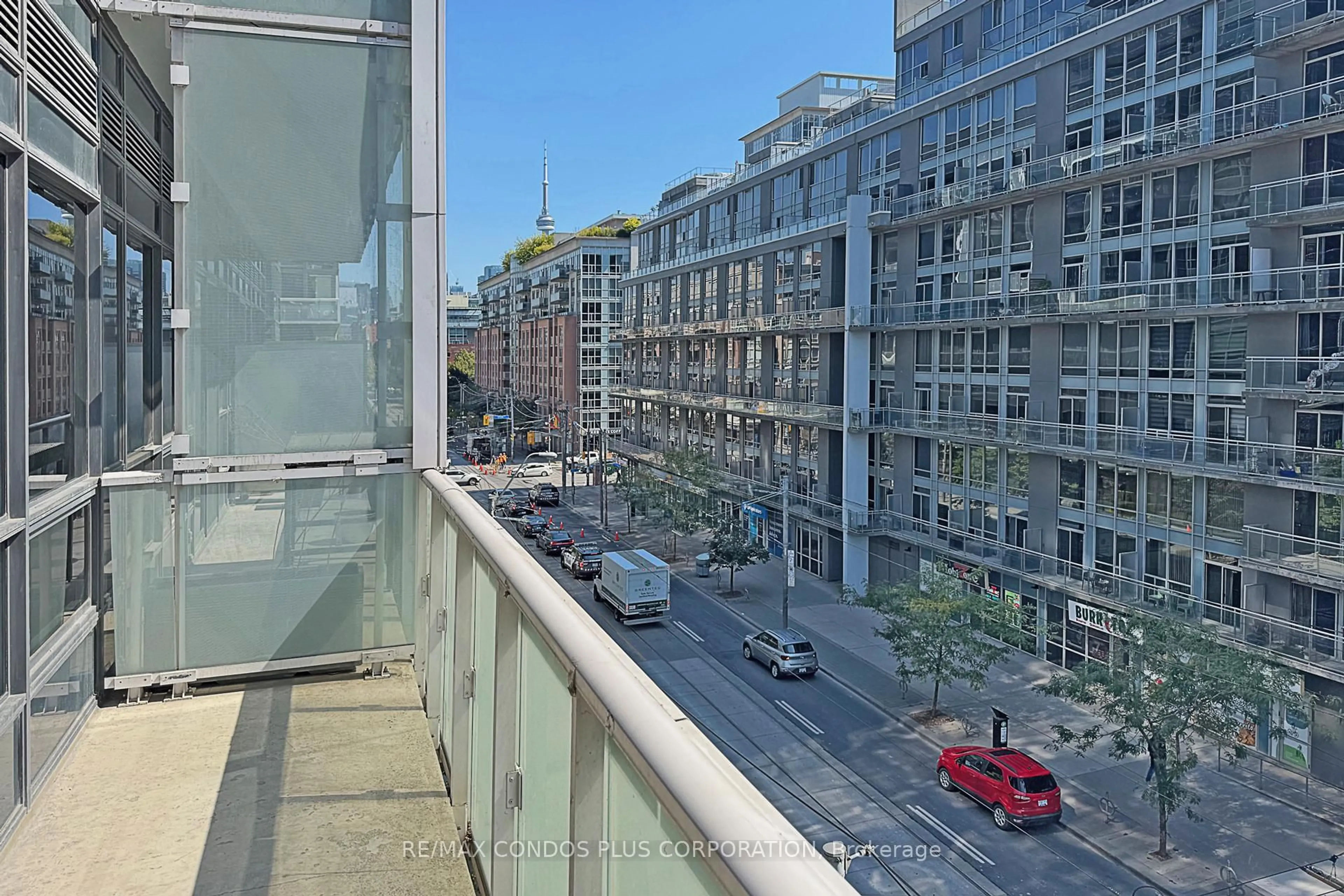 Balcony in the apartment, city buildings view from balcony for 1030 King St #444, Toronto Ontario M6K 0B4