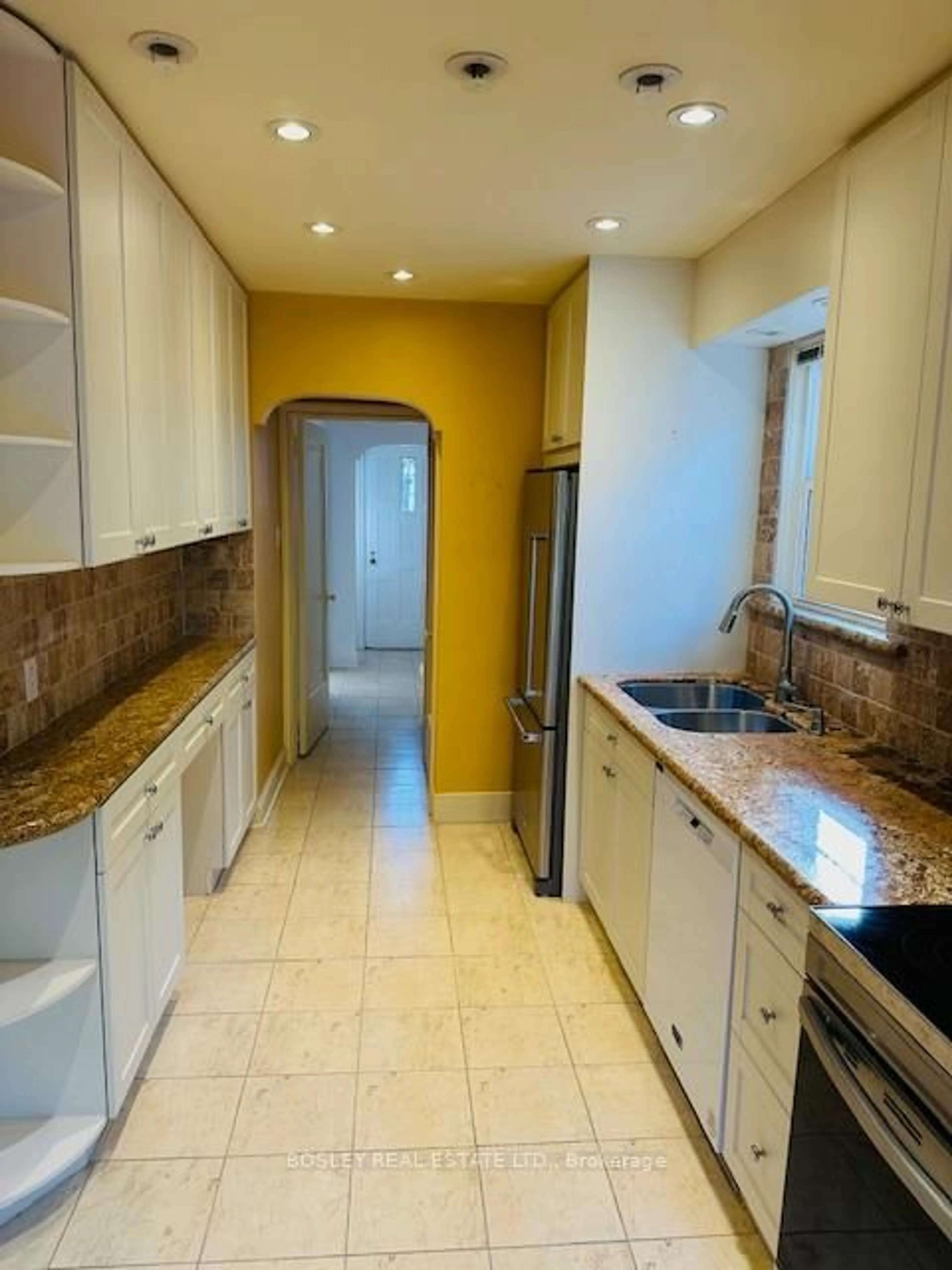 Kitchen with laundary machines, ceramic/tile floor for 10 Astor Ave, Toronto Ontario M4G 3M2
