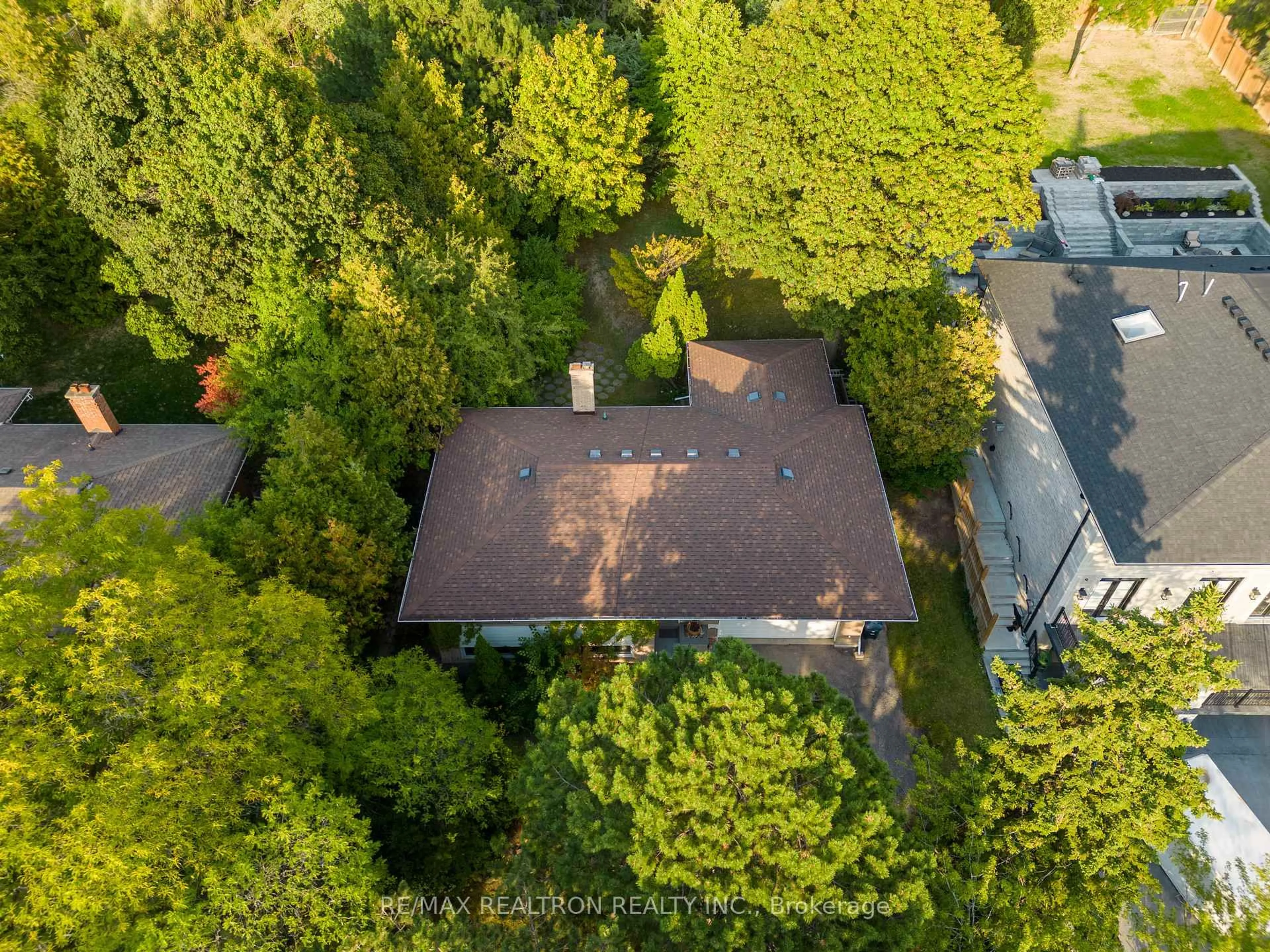 A pic from outside/outdoor area/front of a property/back of a property/a pic from drone, forest/trees view for 120 Laurentide Dr, Toronto Ontario M3A 3E5