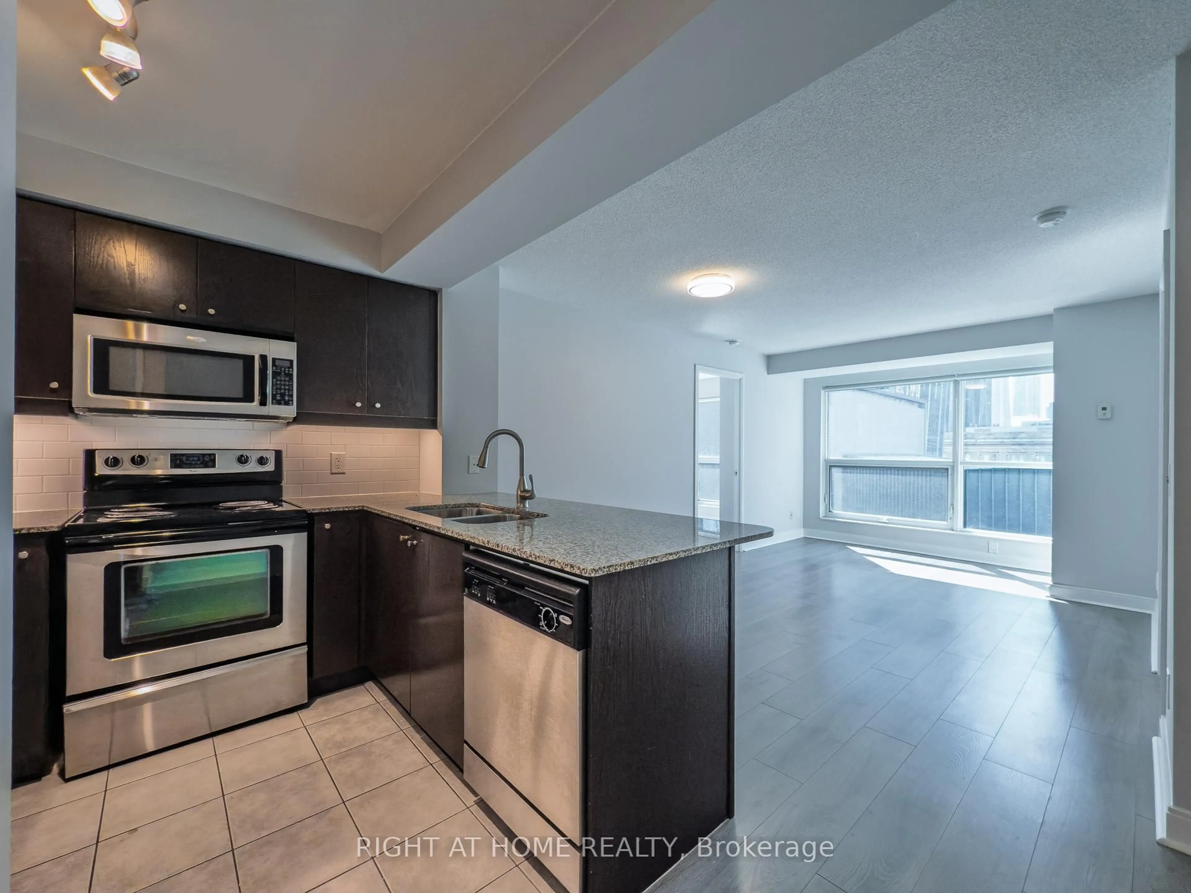 Open concept kitchen, unknown for 1 Scott St #806, Toronto Ontario M5E 1A1