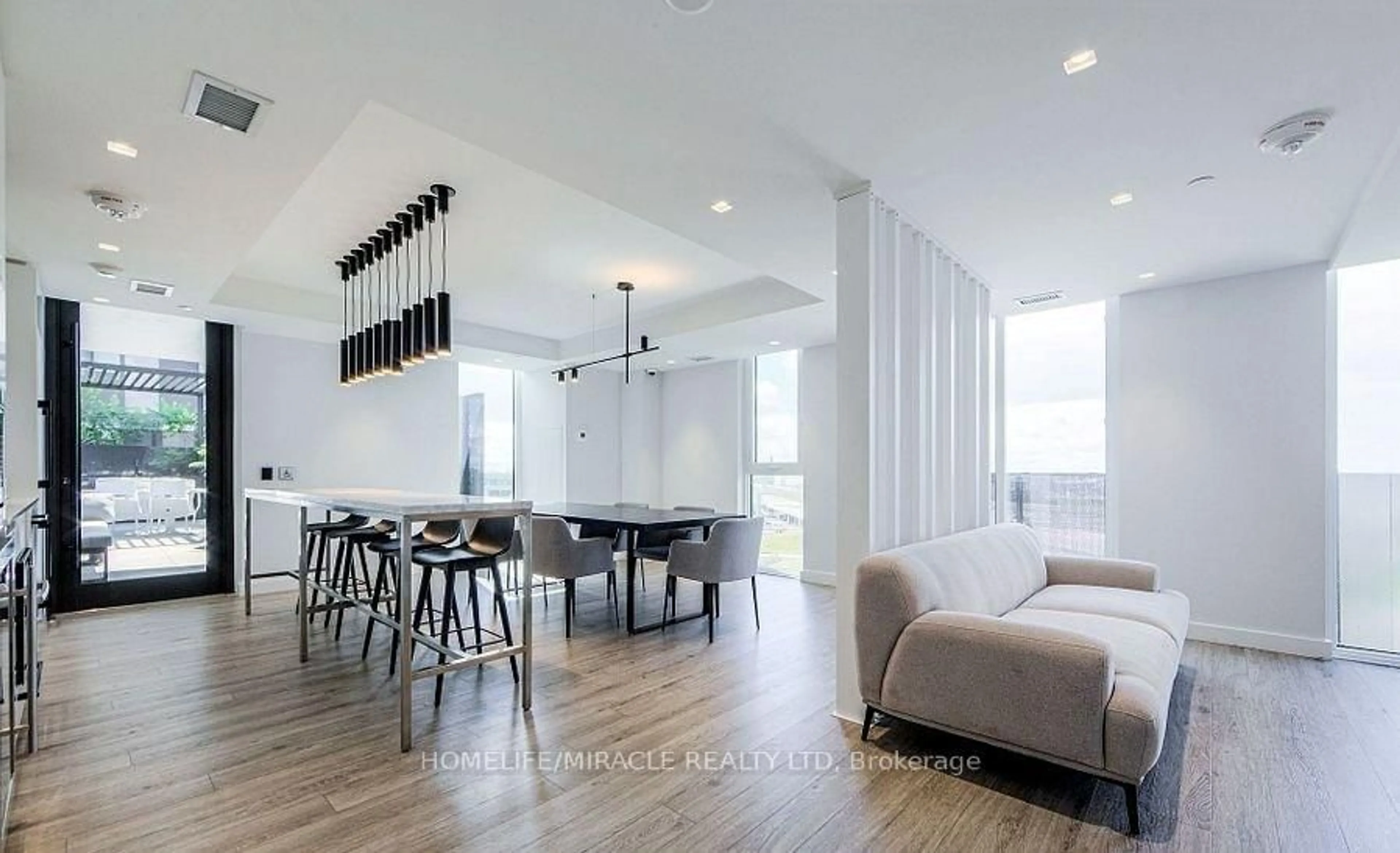 Dining room, wood/laminate floor for 30 Tretti Way #911, Toronto Ontario M3H 0E3